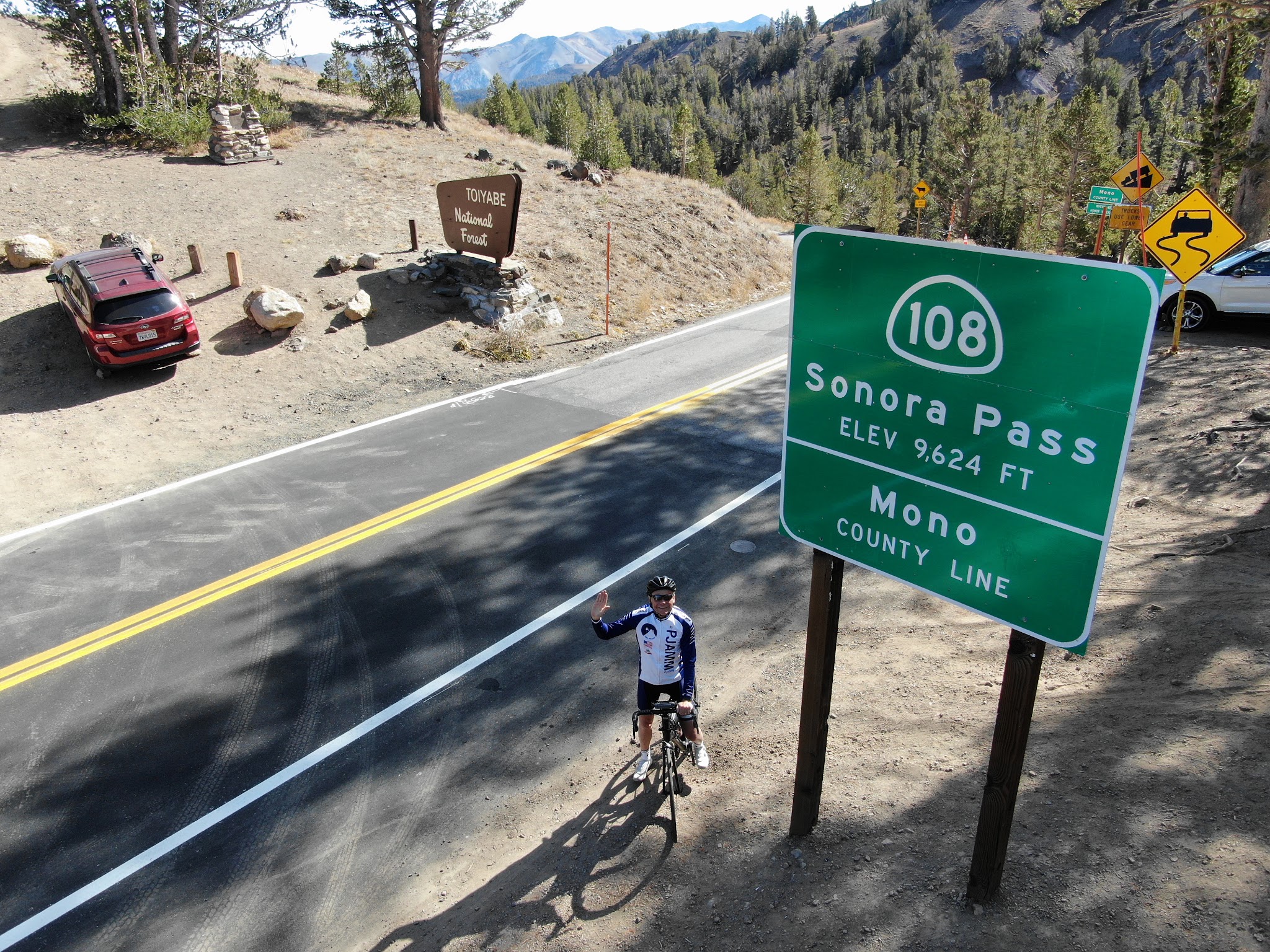 Cycling Sonora Pass West - Pass sign at top of climb