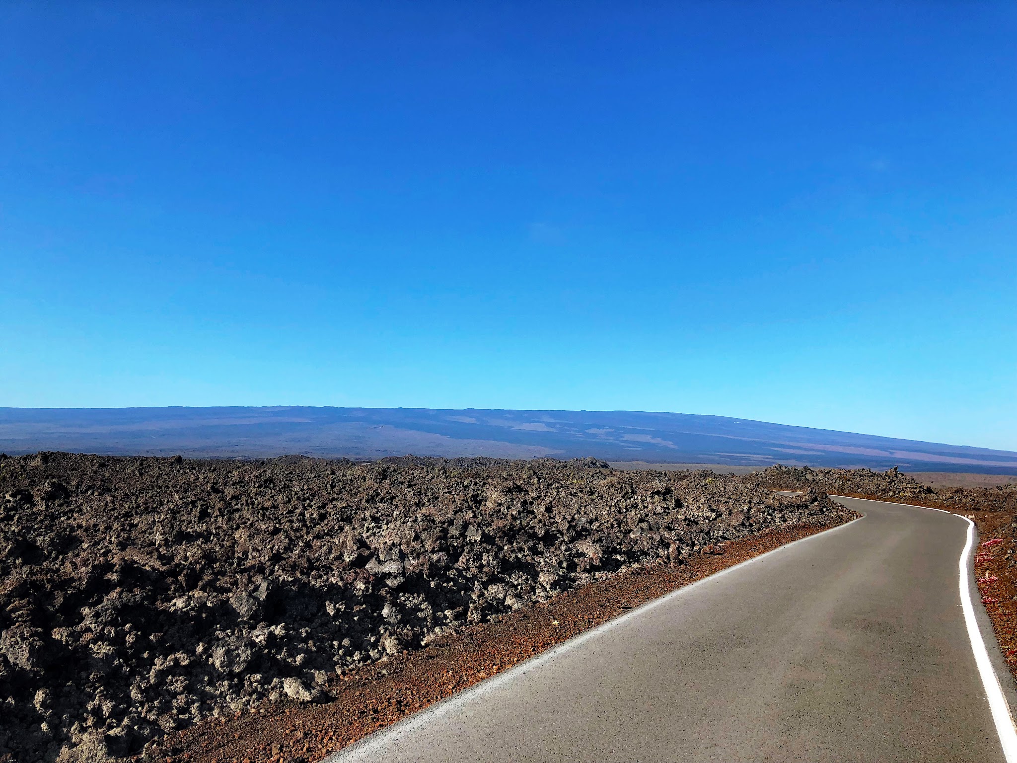 View of Mauna Loa shield volcano from distance 