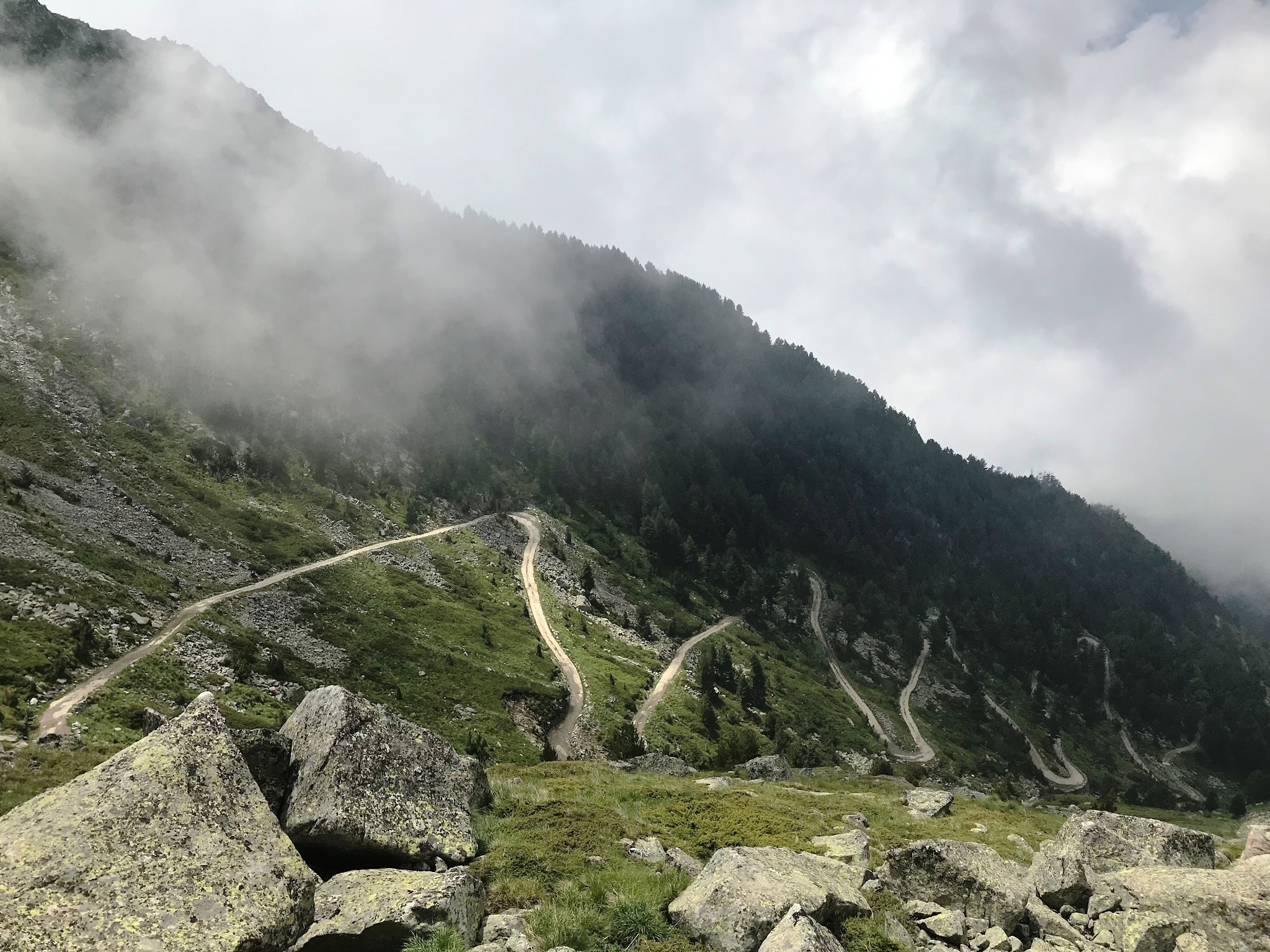 Cycling Top World Bike Climbs  - Rila Bulgaria - mountains, roadway and hairpins in fog and clouds