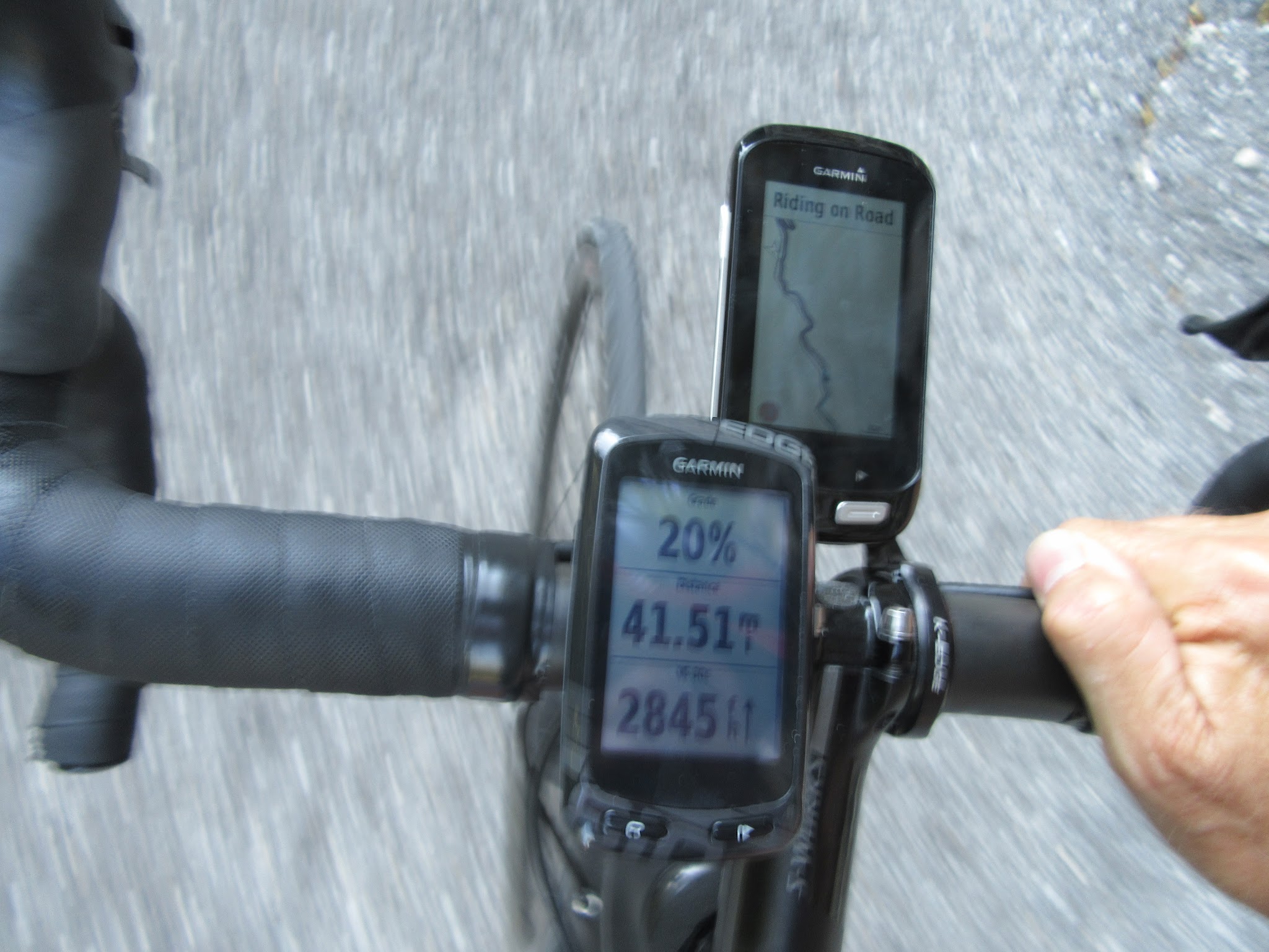 Bicycle ride Monte Grappa from Seren - garmin showing 20% grade and map on handlebars