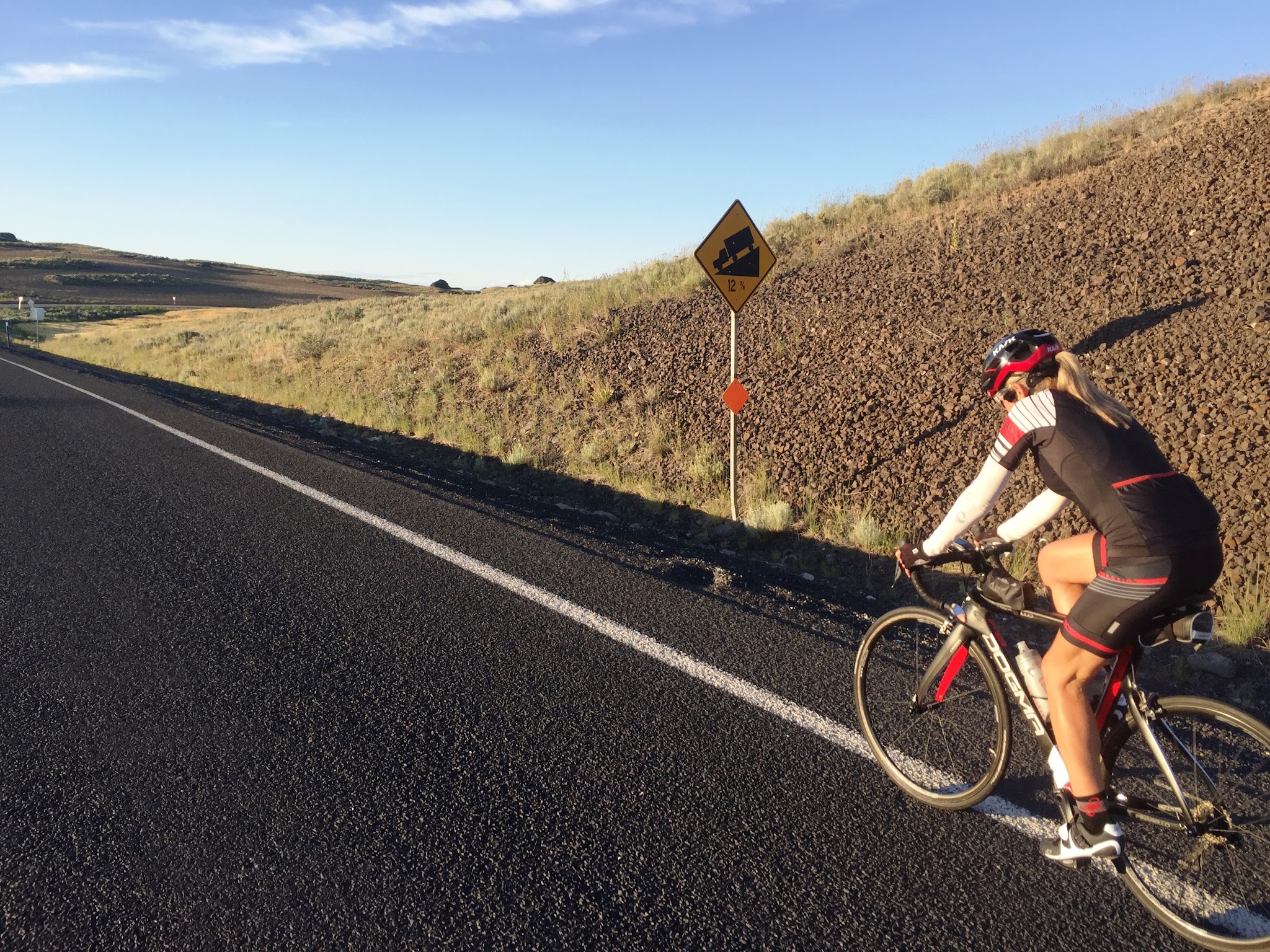 Washington's Top Climbs - Cyclist ascending steep section of roadway on McNeil Canyon climb in Chelan Falls