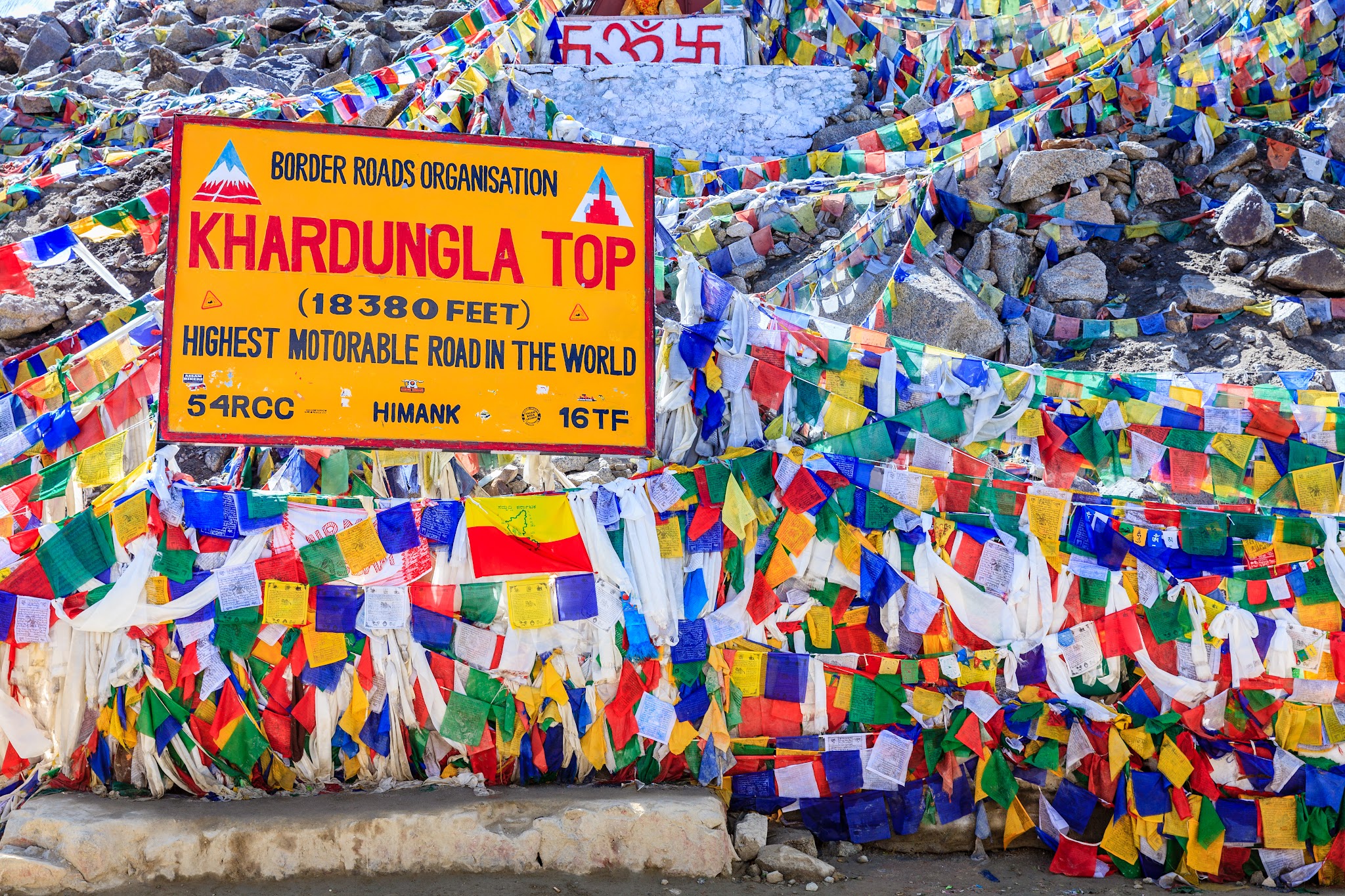Bike ride Khardung La Pass -  prayer flags at summit