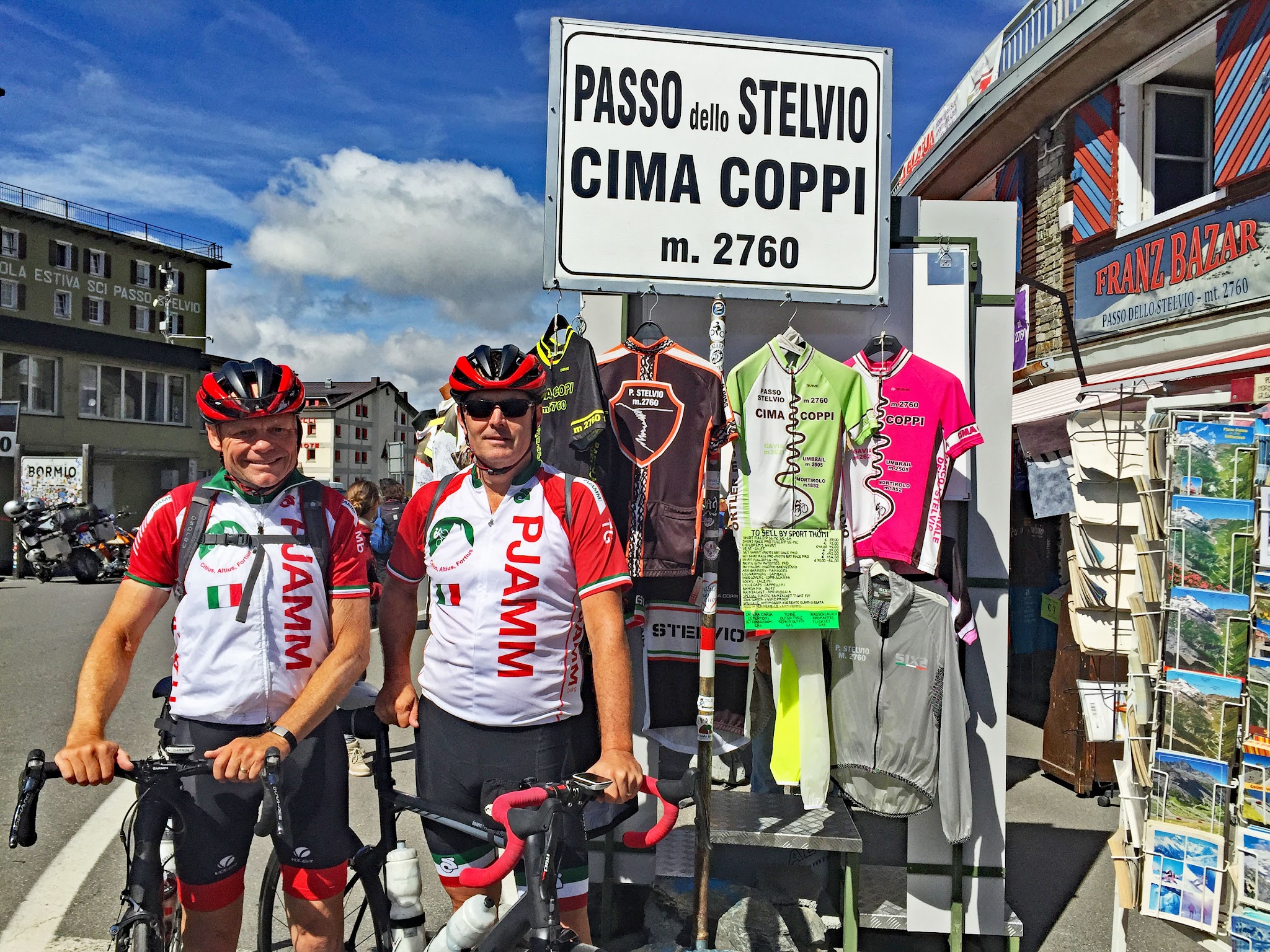 John Johnson and Bill Cappobianco Cycling Passo dello Stelvio - PJAMM Cycling John Johnson and Bill Cappobianco at the Passo sign