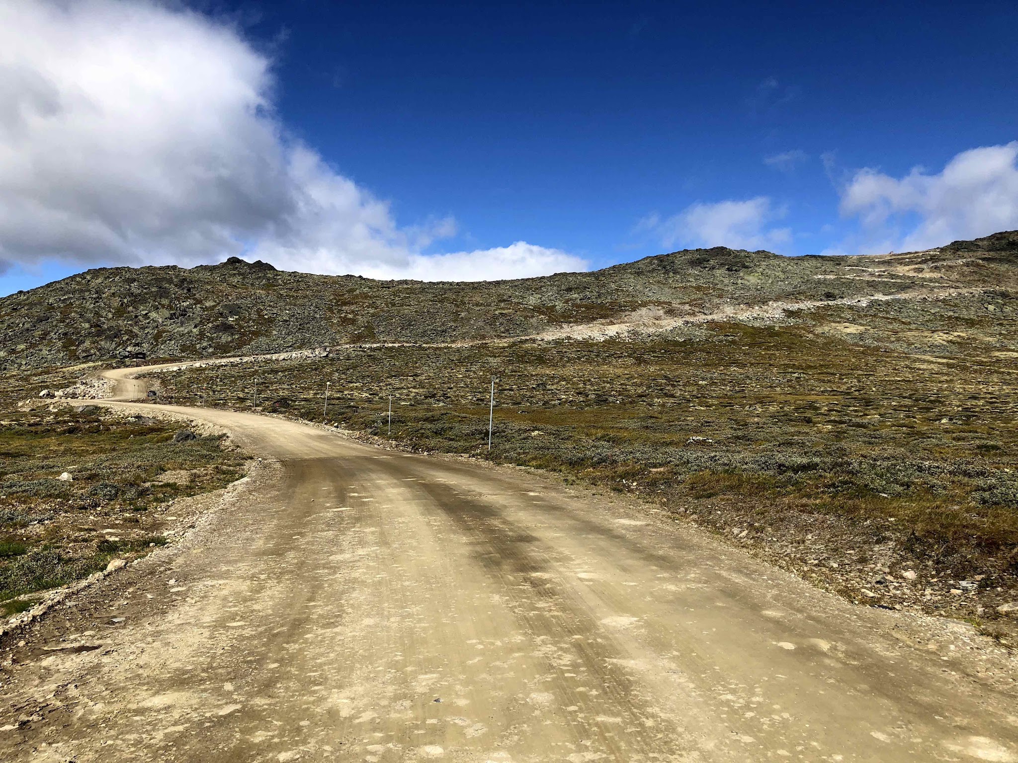 Climbing Tronfjellet - Tron by bike - dirt road