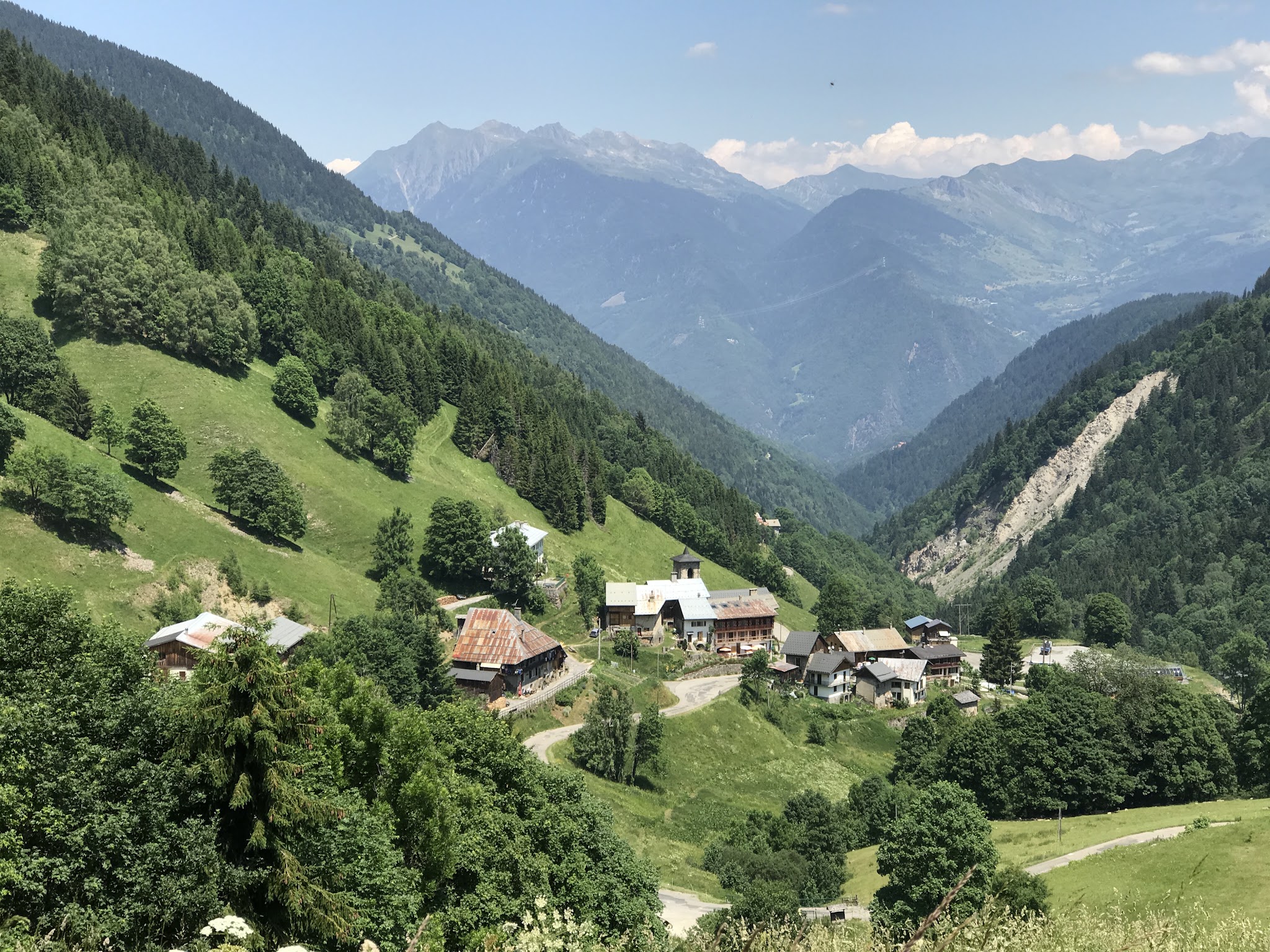 France greatest bike climbs Col de Madeleine from La Léchère - view of village and roadway