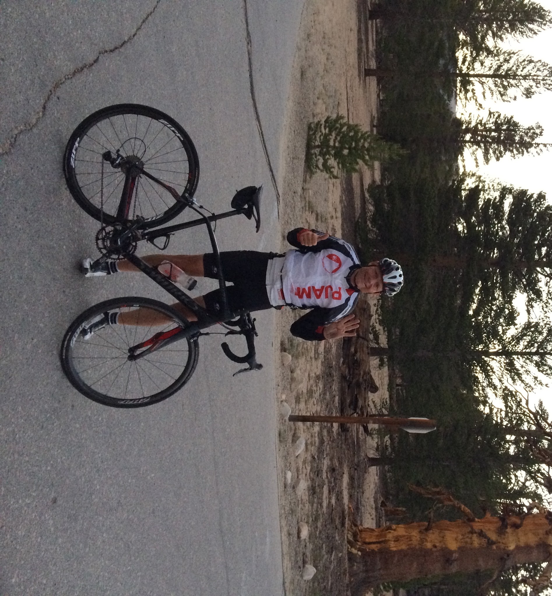 John Johnson on Horseshoe Meadows Road Cyclists at top of Horseshoe Meadows Road after riding Horseshoe, Onion Valley Road, White Mountain and Whitney Portal Roads in a day.