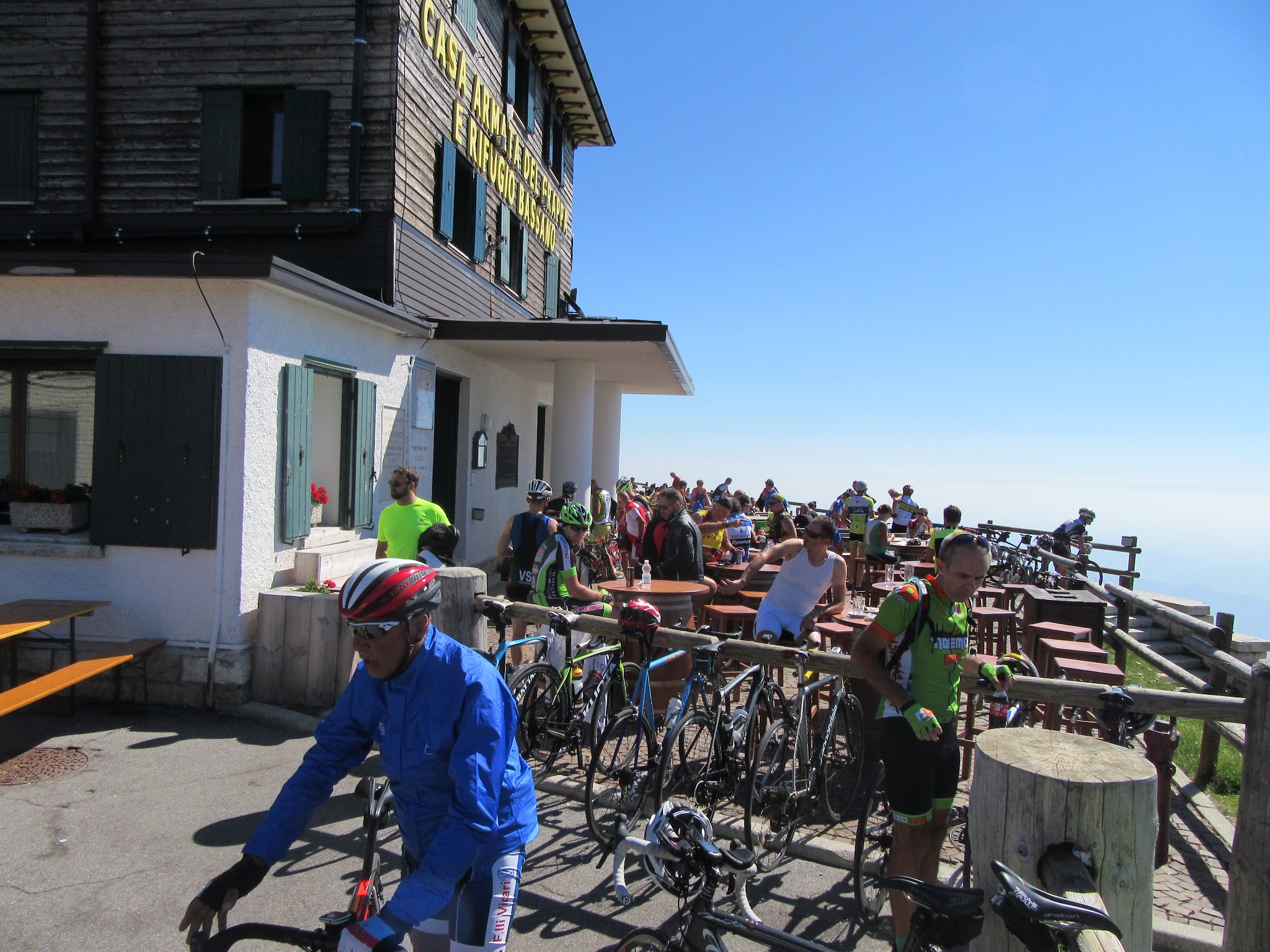 Cycling Monte Grappa from Romano d'Ezzilino - Rifugio Bassano a Cima Grappa - cyclists, bicycles, sign