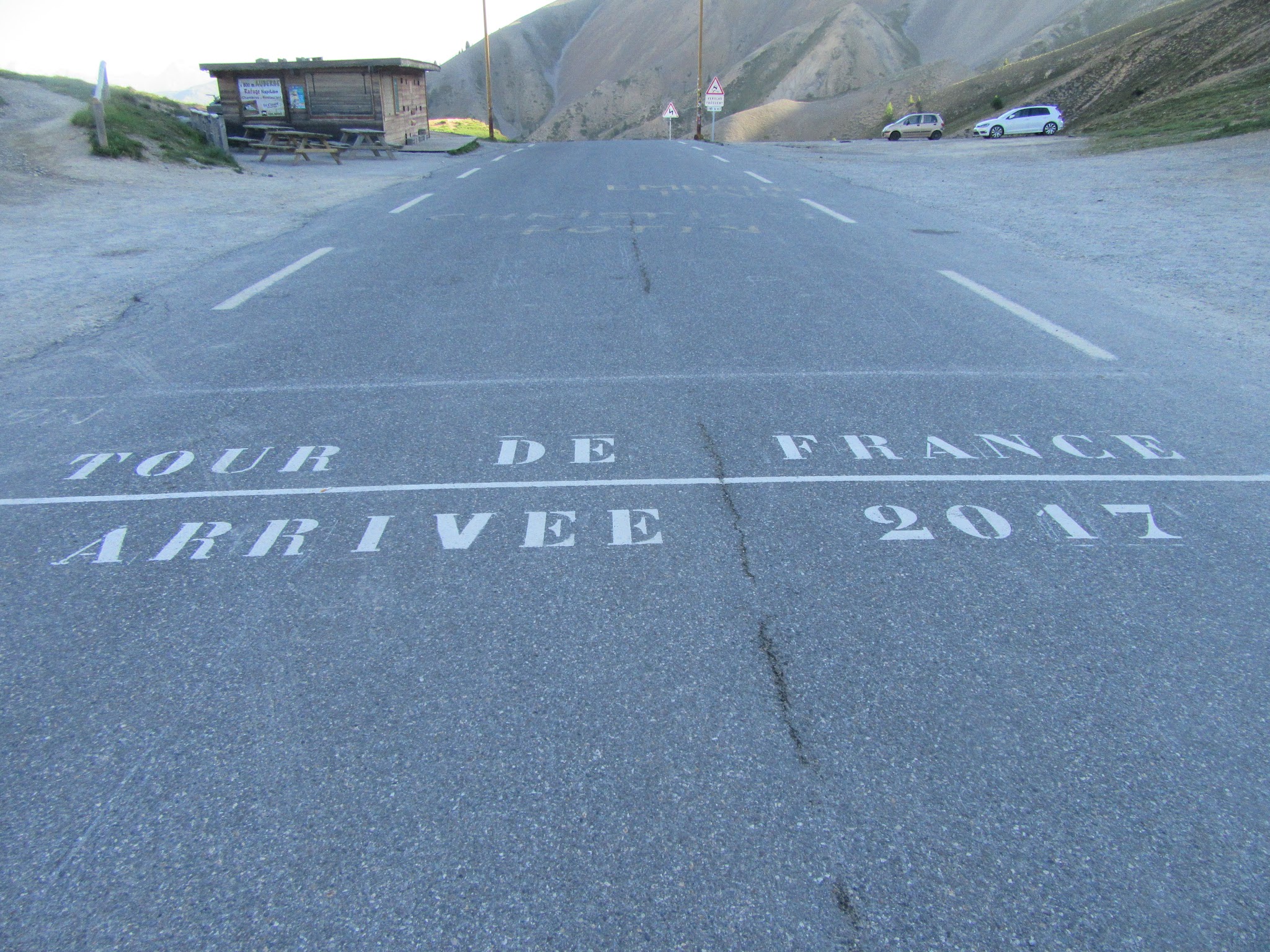 Bicycling to Col d’Izoard Guillestre - Tour de France writing on roadway at the col