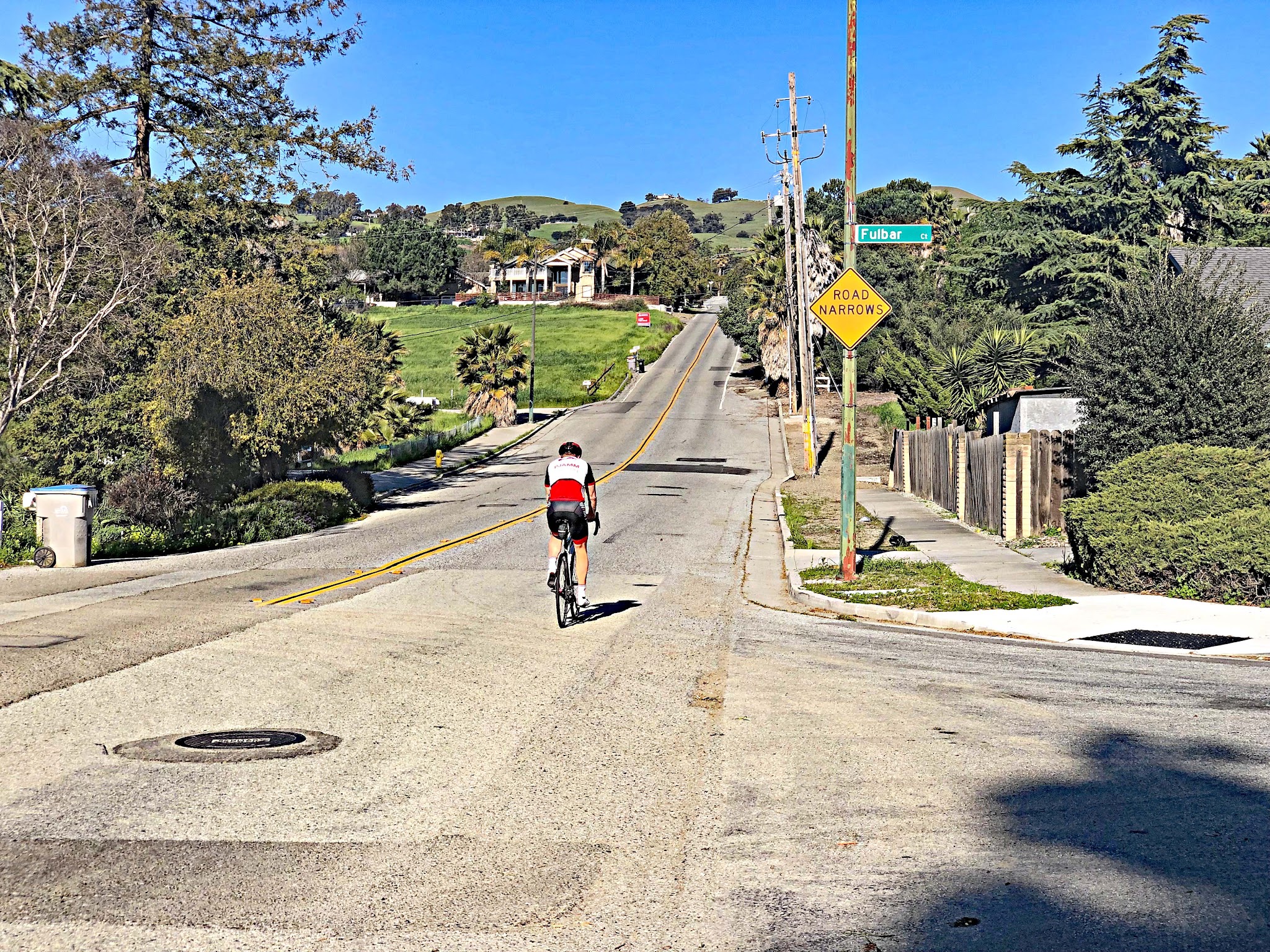Riding bike up Sierra Road  - view of start and road - PJAMM Cycling cyclist on bike