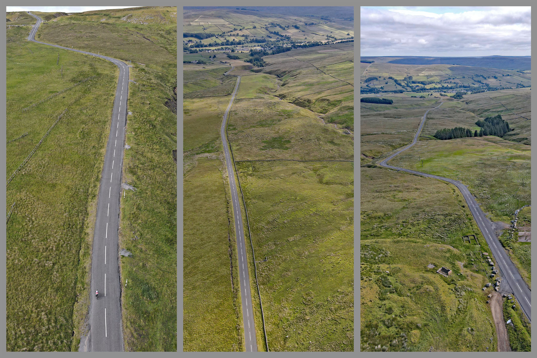 aerial drone view shows road cutting through vast green pasturelands