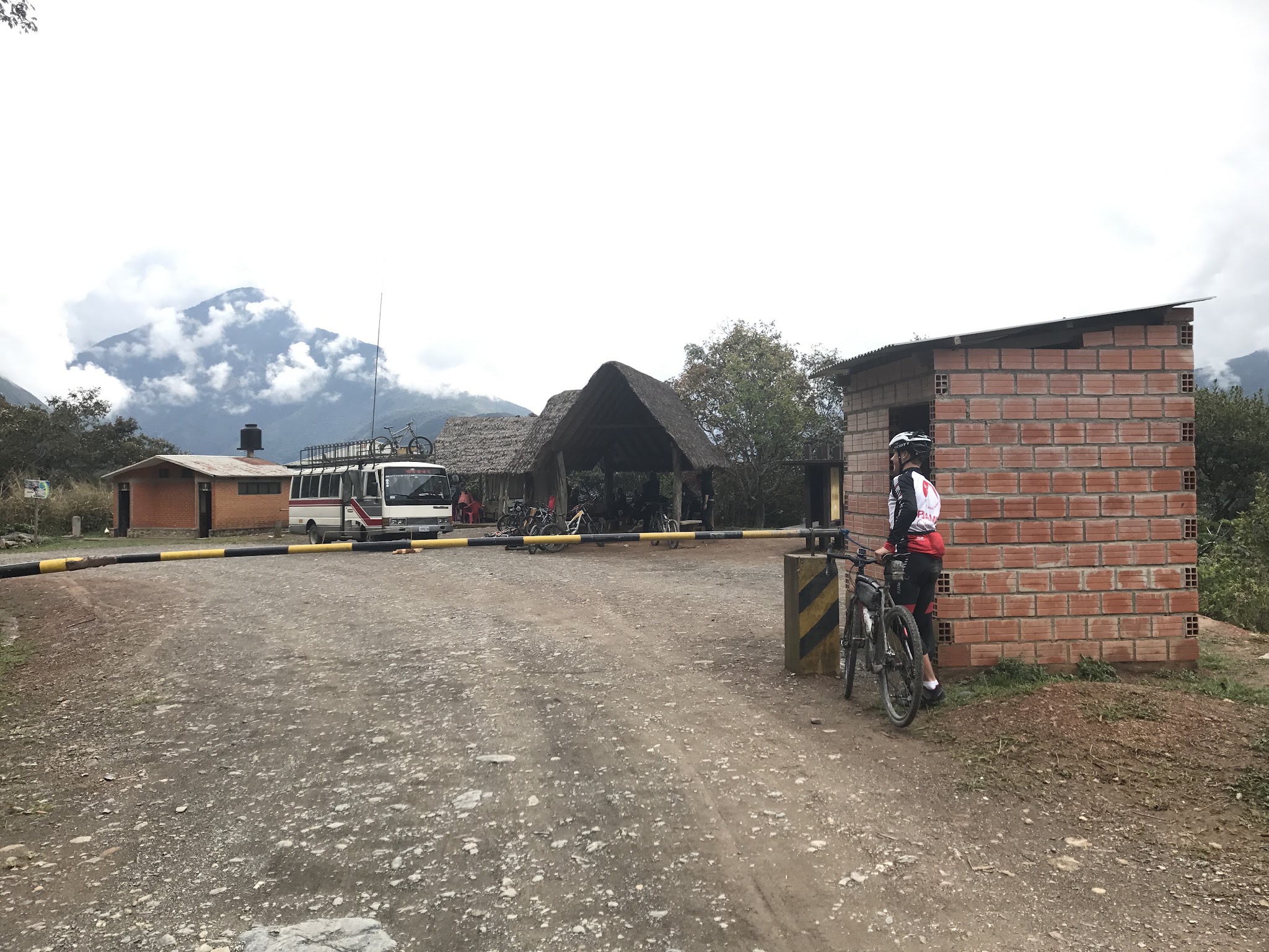 Toll Gate Cyclist at toll gate on Death Road with bicycle