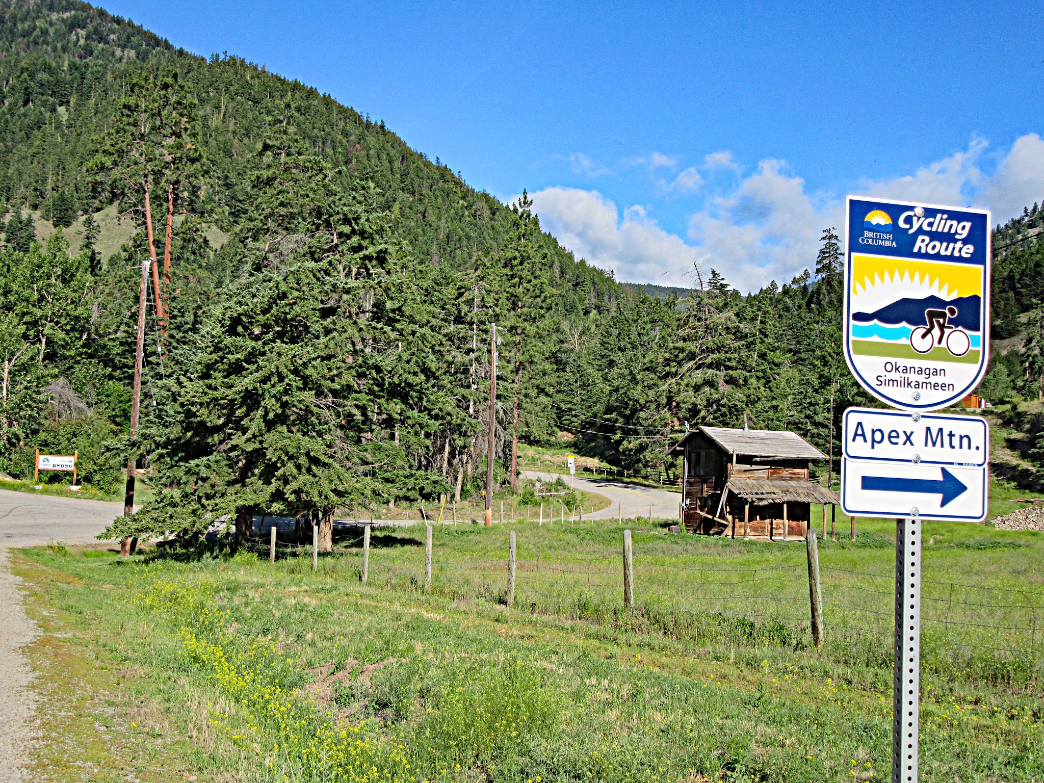 cycling Apex from Penticton - road, barn and cycling sign