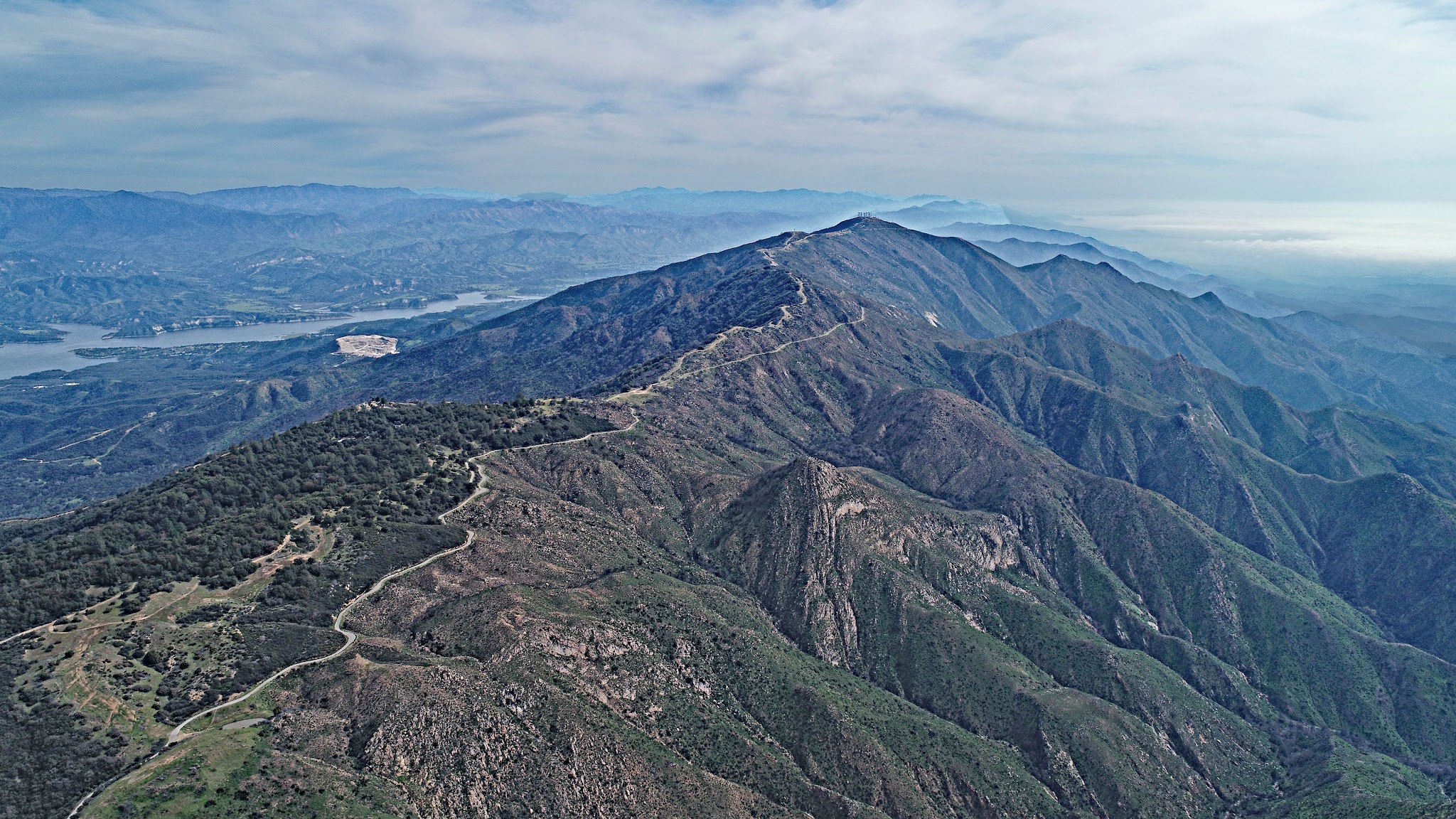 Bike climb Refugio Road Climb - W. Camino Cielo - aerial drone photo of roadway, mountains, finish
