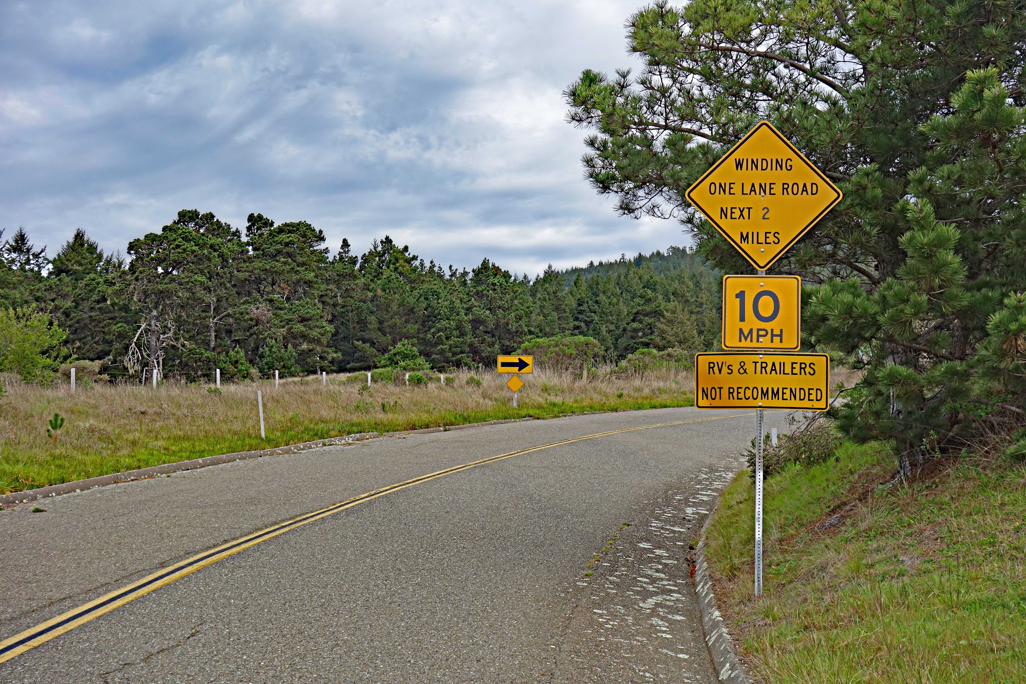 Bike climb Fort Ross Road - Fort Ross sign on Hwy 1
