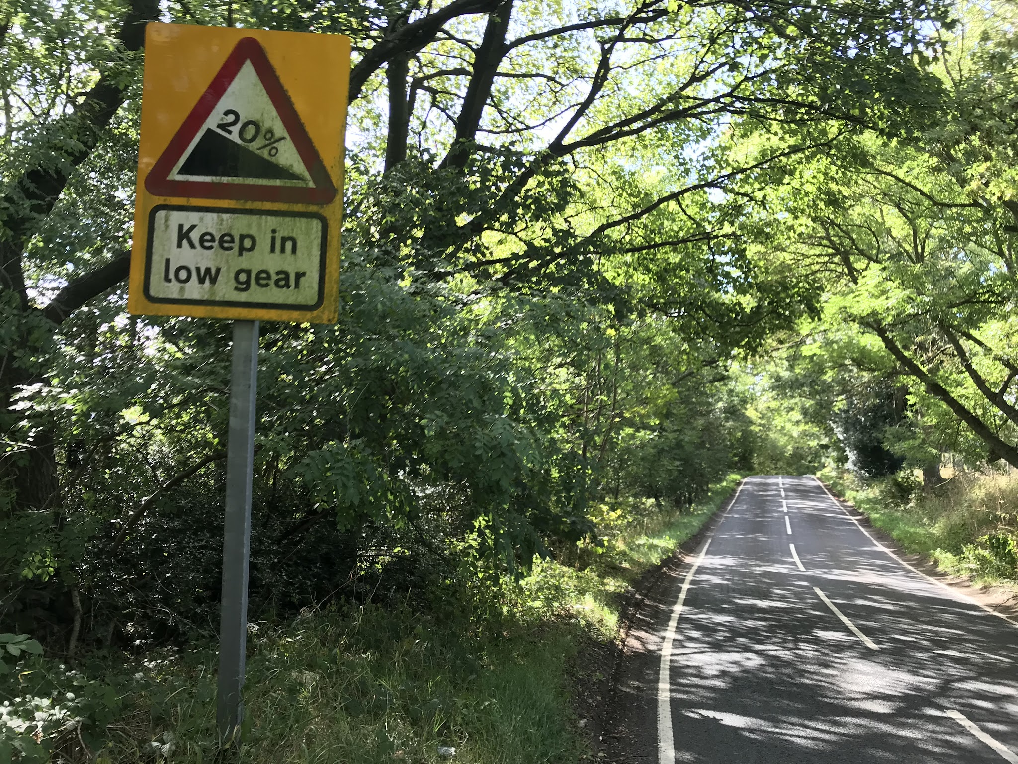 Bike climb Peth Bank #60 Simon Warren 100 Greatest Cycling Climbs  - steep grade sign and road