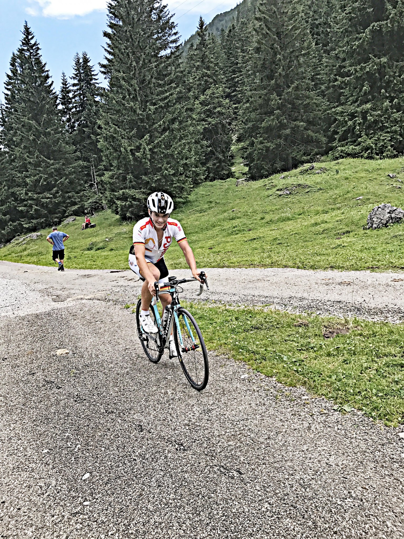 Bike climb of Nebelhorn - cyclist riding bike on road
