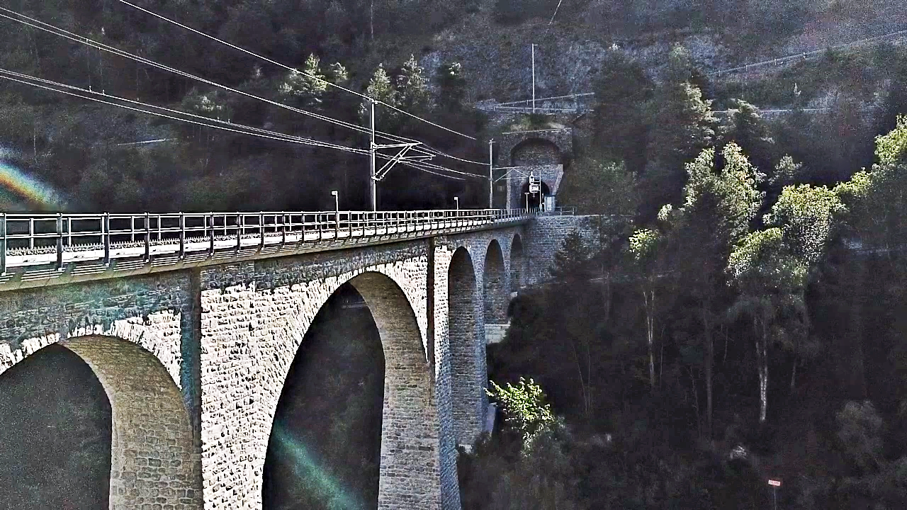 Climbing Breithorn by bike - bridge over Rhone River