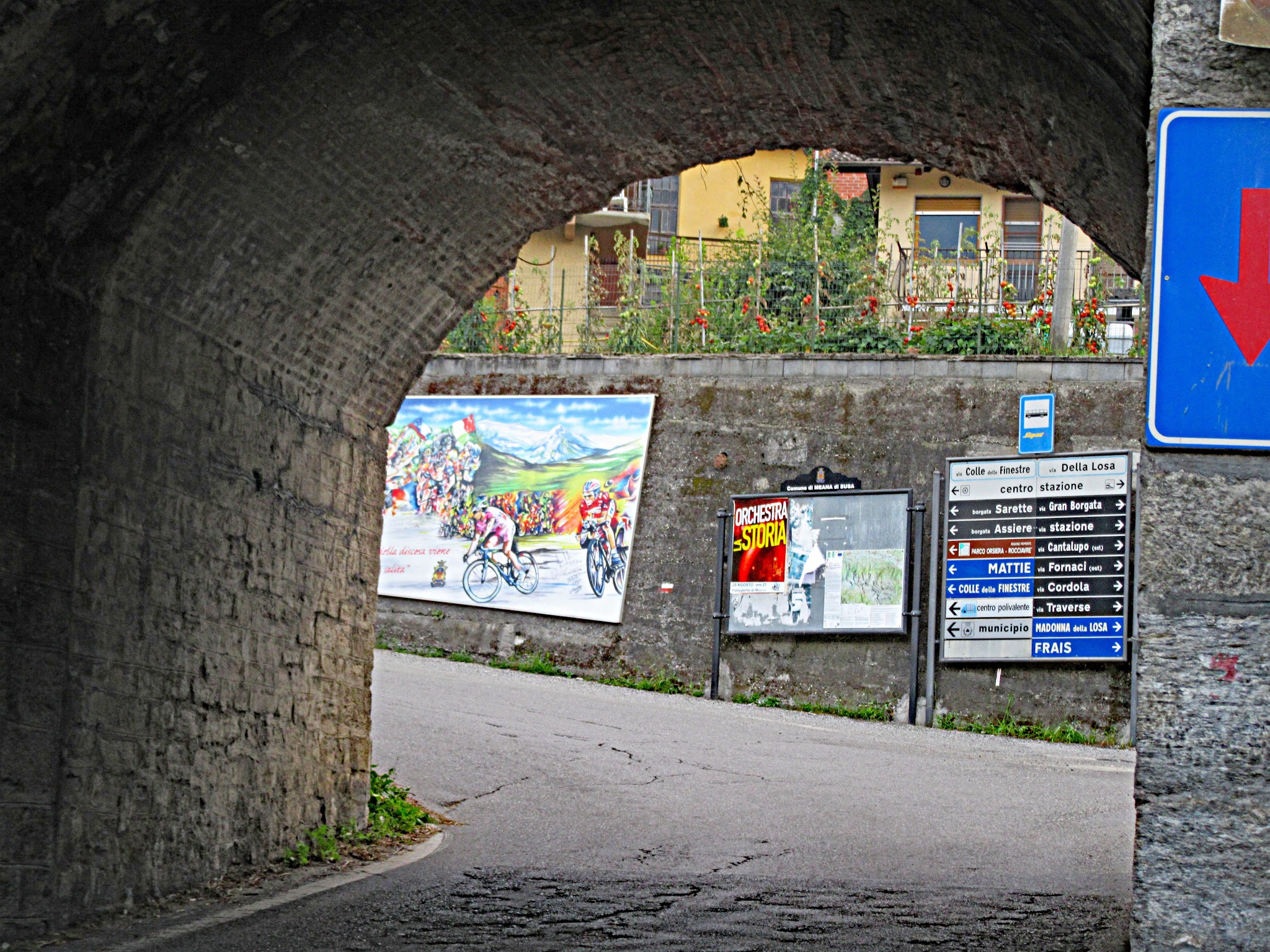 Bike climb Colle delle Finestre - start, tunnel, Giro d'Italia signs, road