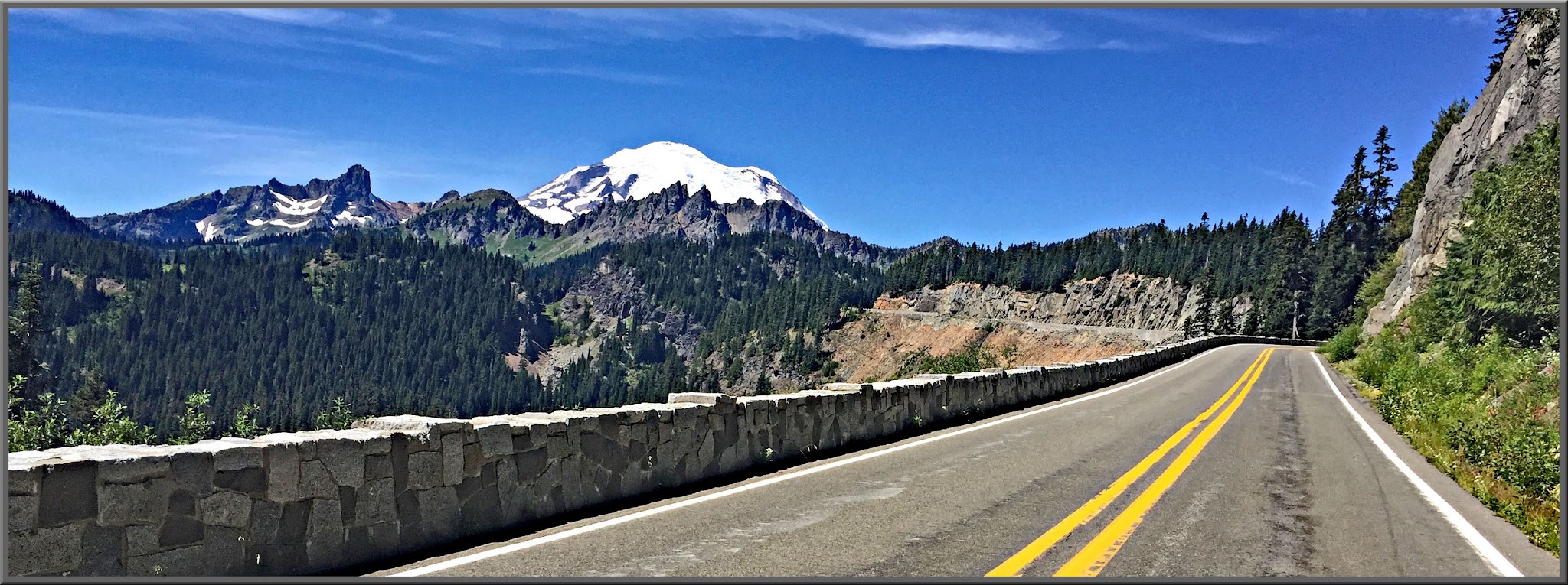 Cycling Chinook Pass, Washington - snow covered Mt. Rainier as seen from the road on Chinook Pass