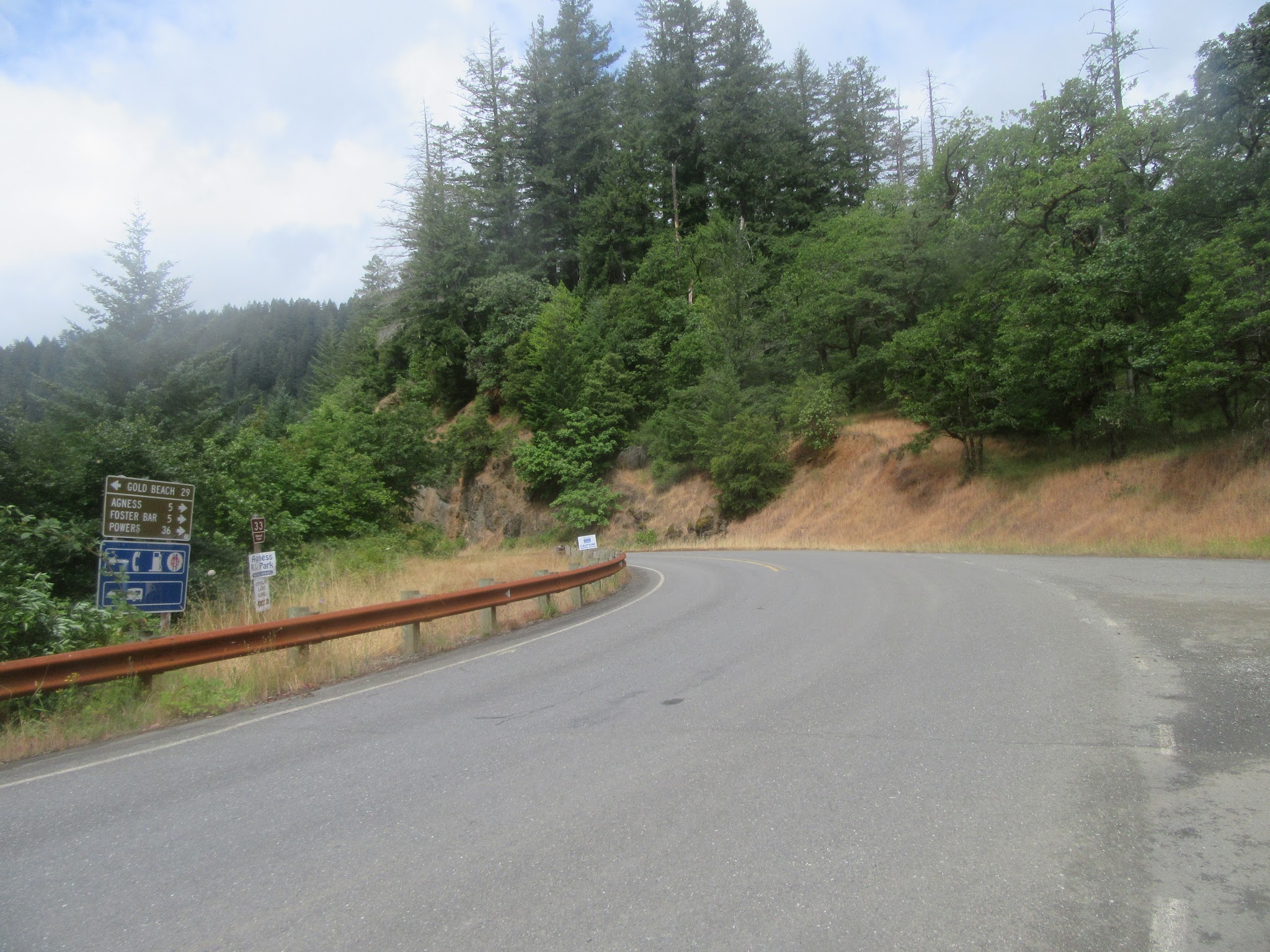 Wide Roadway intersection at climb's start
