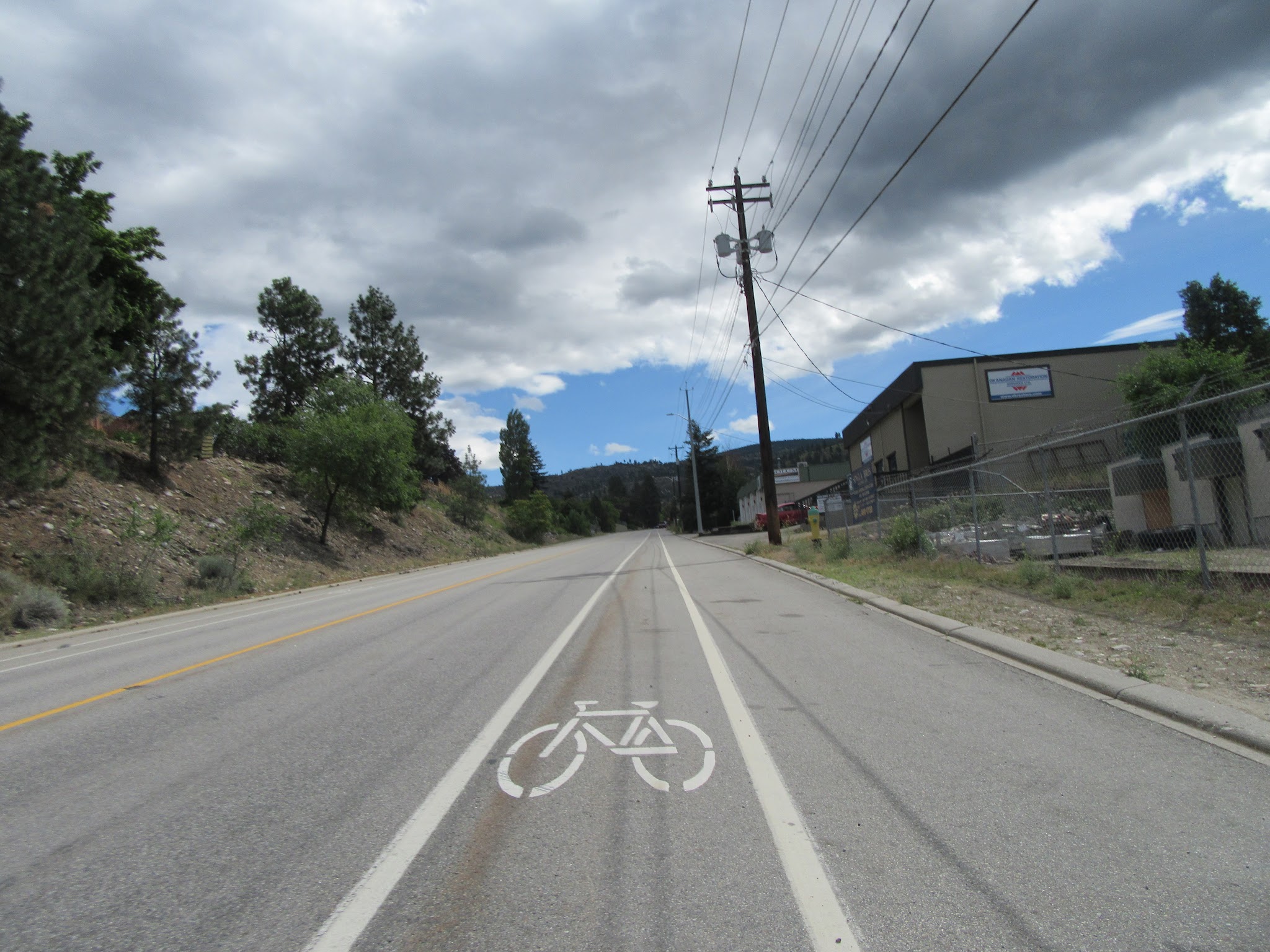 Carmi Avenue Bike climb Carmin Avenue - beware of cyclist sign painted on road