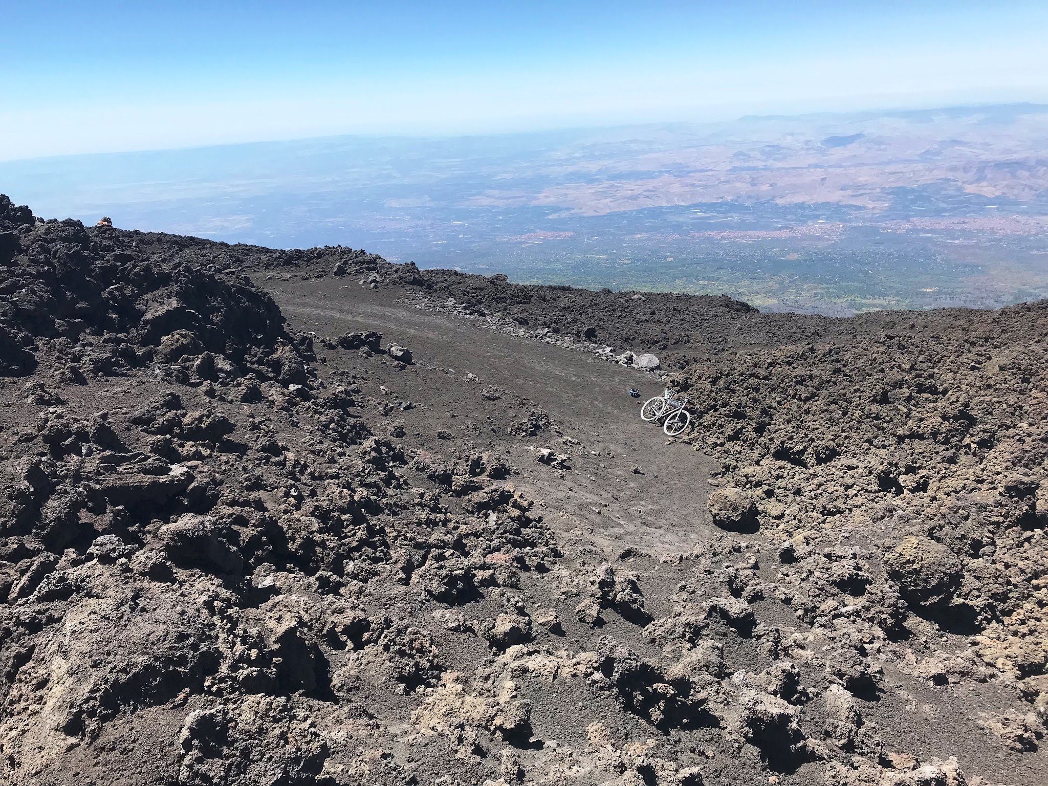 View down at bike from end of road on Mount Etna, Sicily