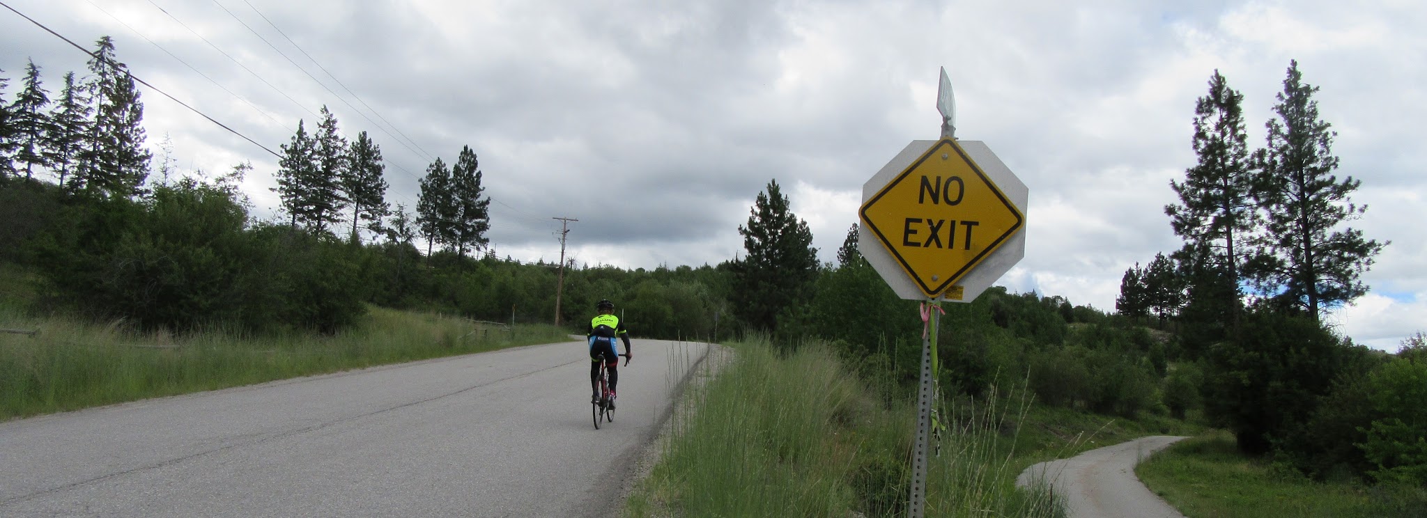 Carmi Avenue Cycling Carmi Avenue - cyclist passing no outlet sign