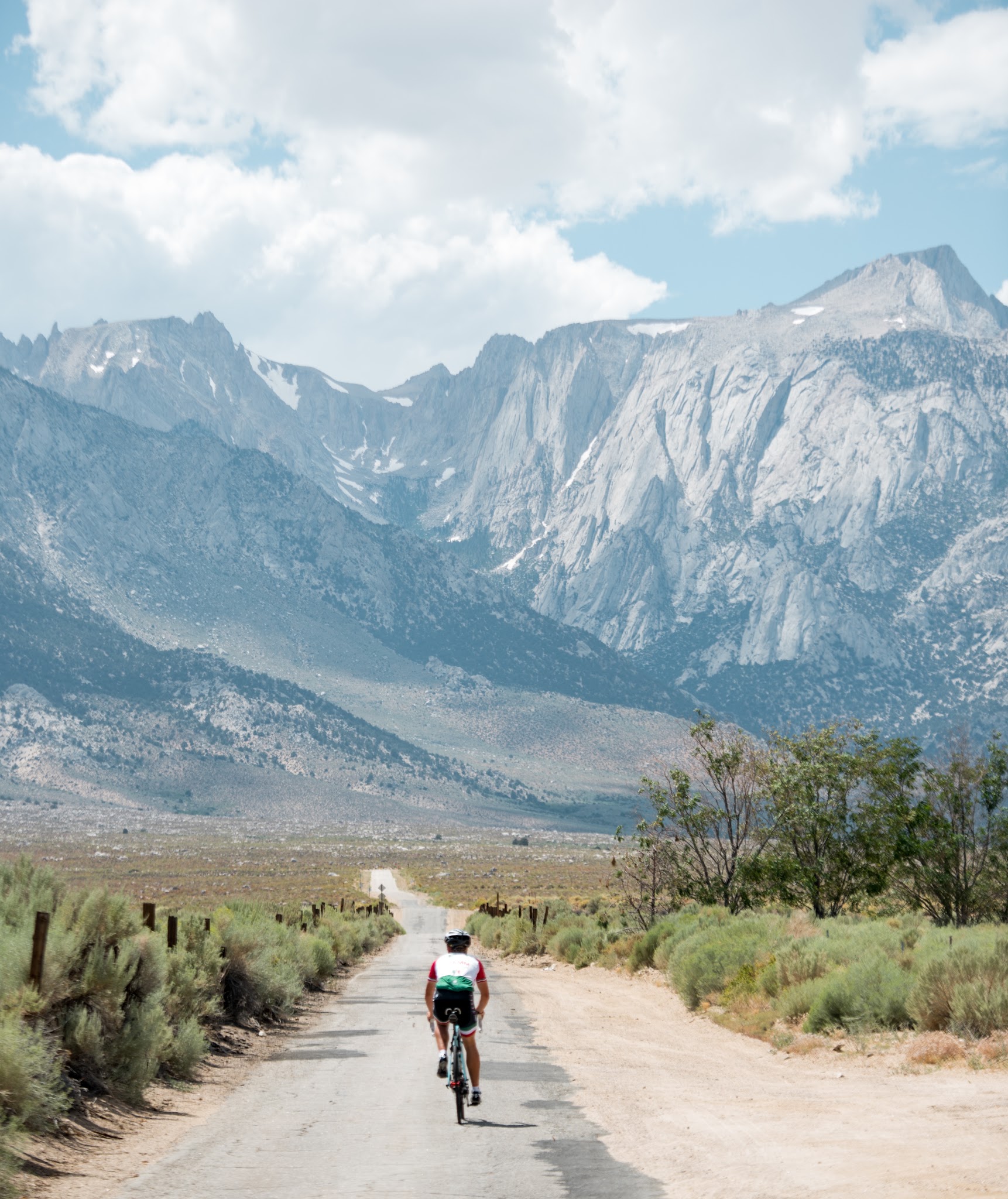 Lubken Canyon Road Cyclist riding bike up Lubken Canyon Road, Big Pine, Owens Valley