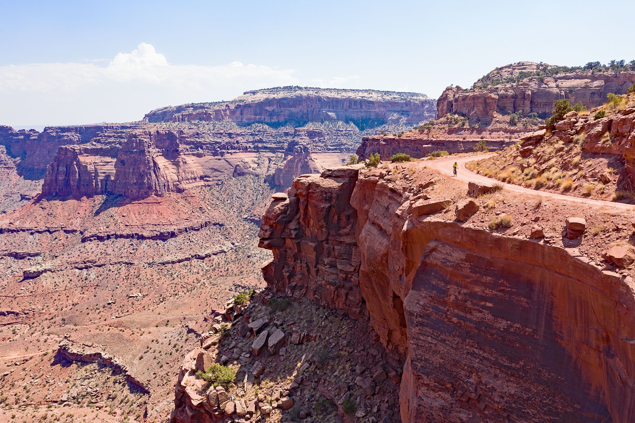 Cycling Shafer Trail, Canyonlands National Park - gorgeous views of canyons and red and brown striated carved canyon sides