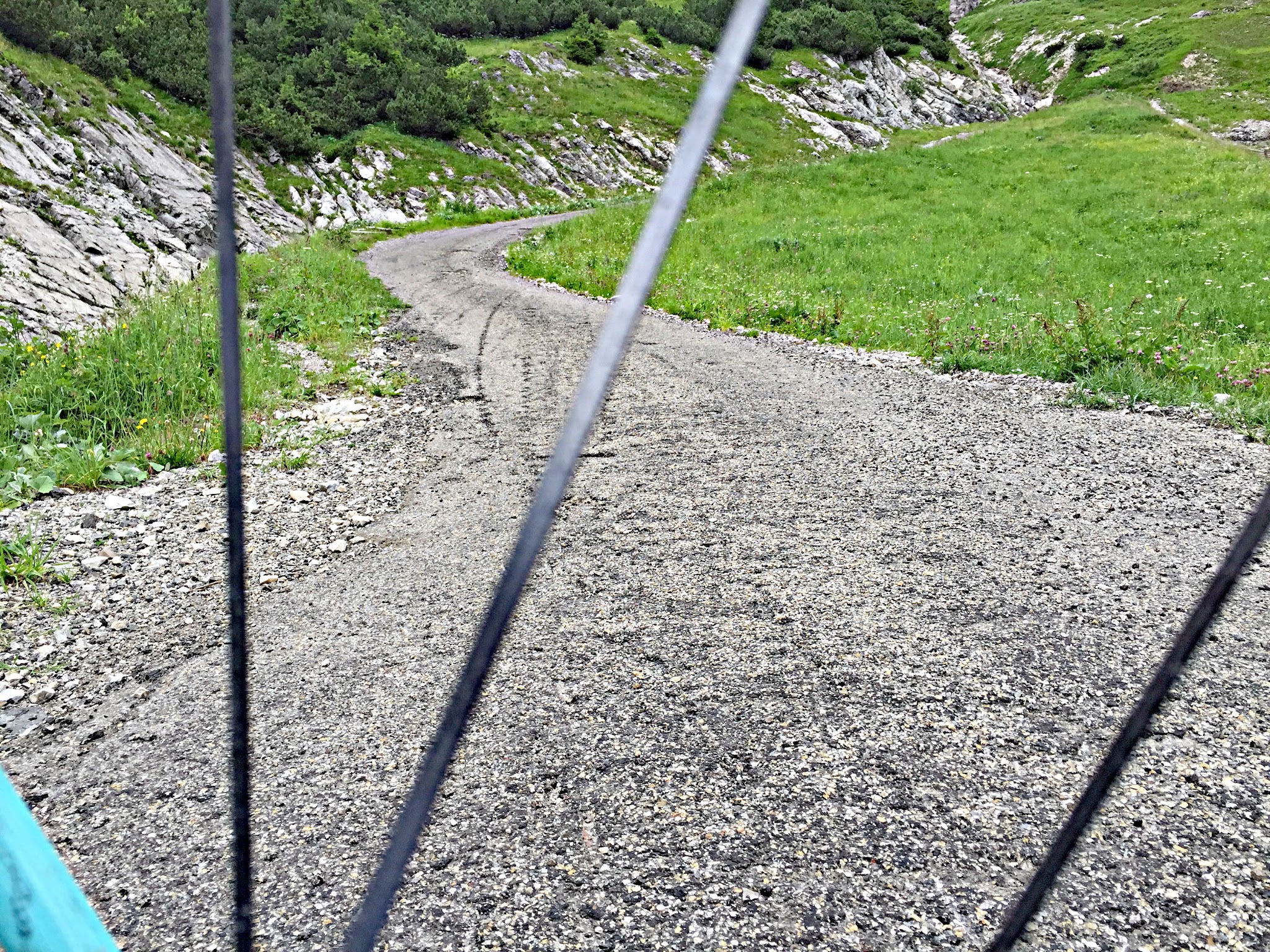 Cycling Nebelhorn  - steep roadway through wheel spokes
