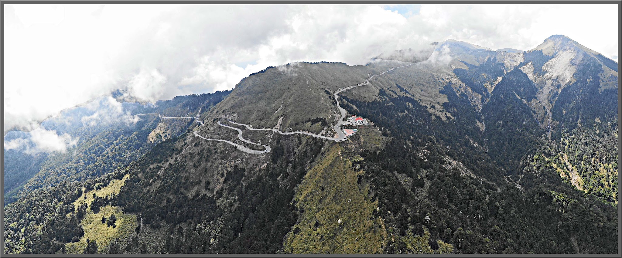 Cycling  Wuling Pass West - hairpins, cyclist