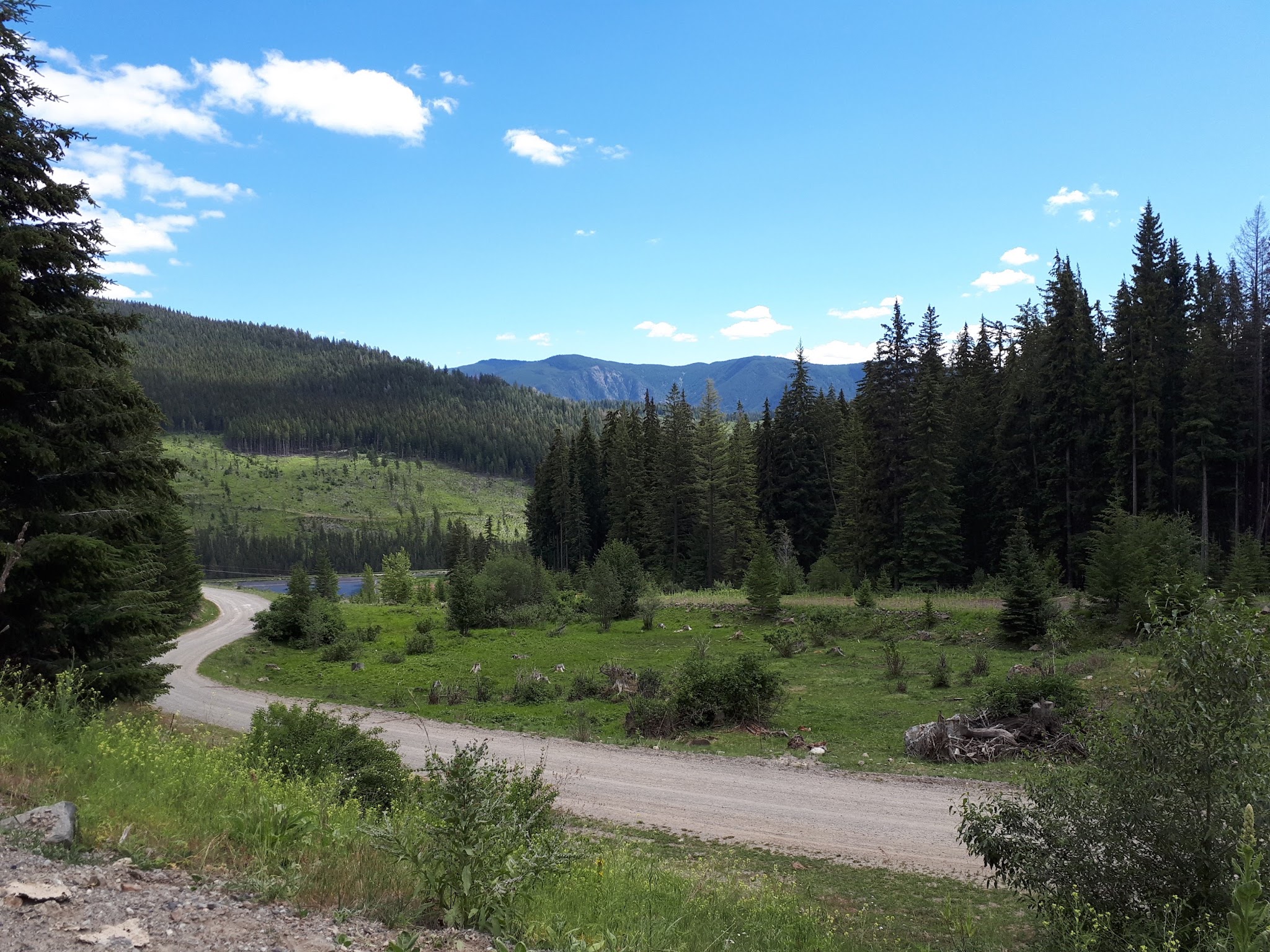 Bicycle climb of Hedley to Apex - gravel road and lake