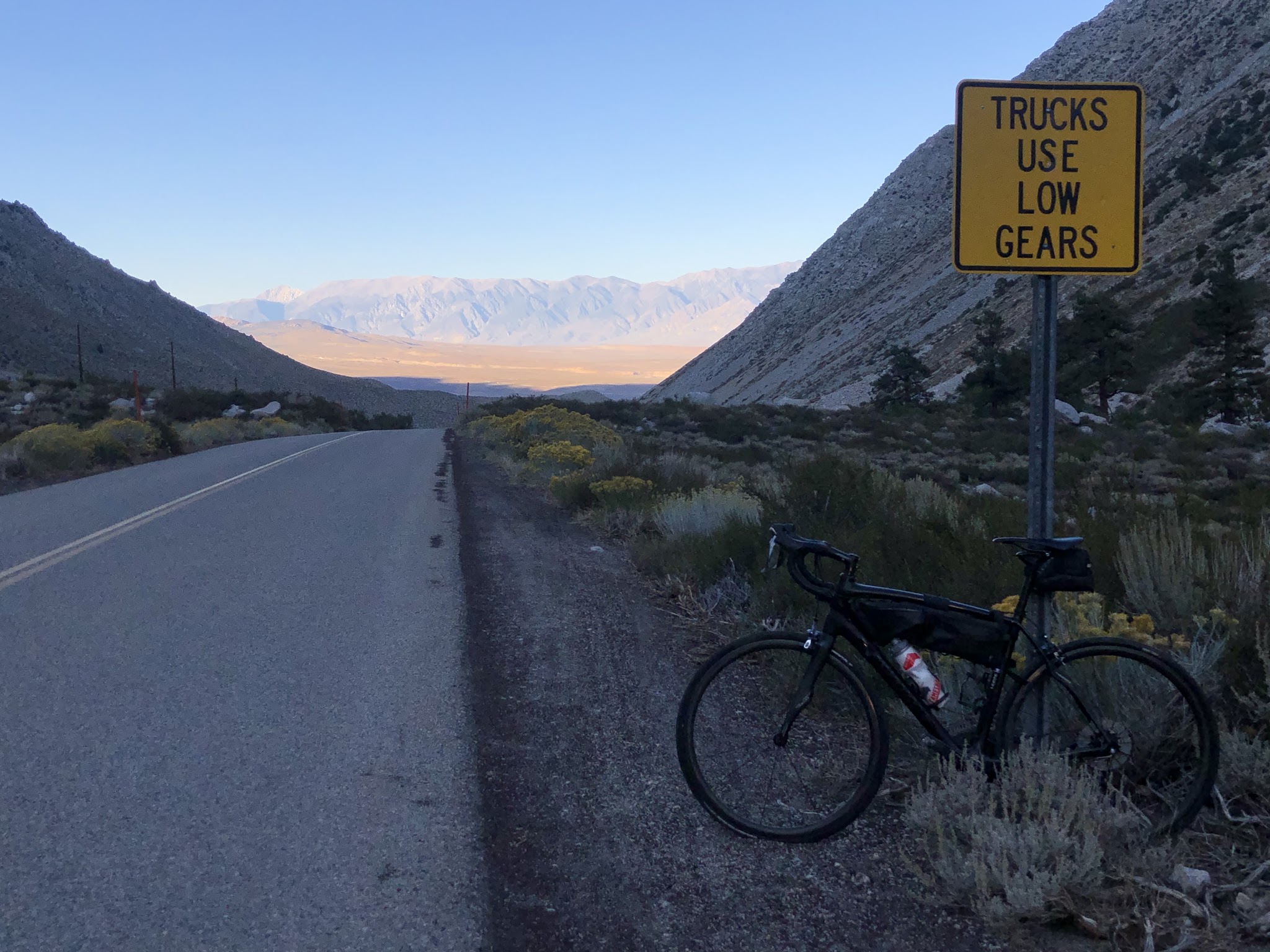 Cycling Pine Creek Road , Owens Valley - sign and gate at end of road