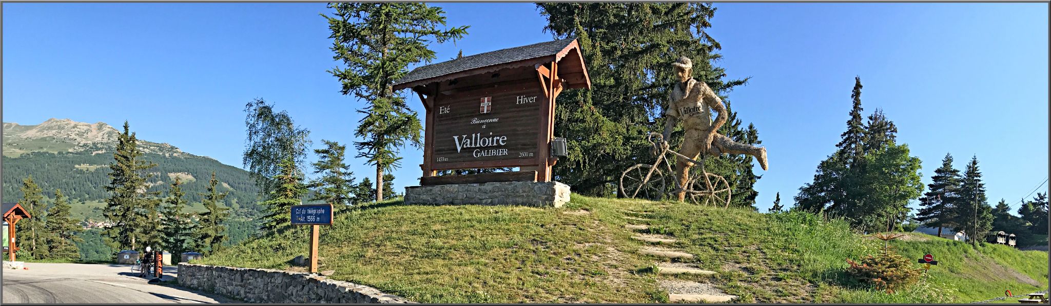 Cycling Col du Télégraphe - wooden chalet style sign reading Valloire