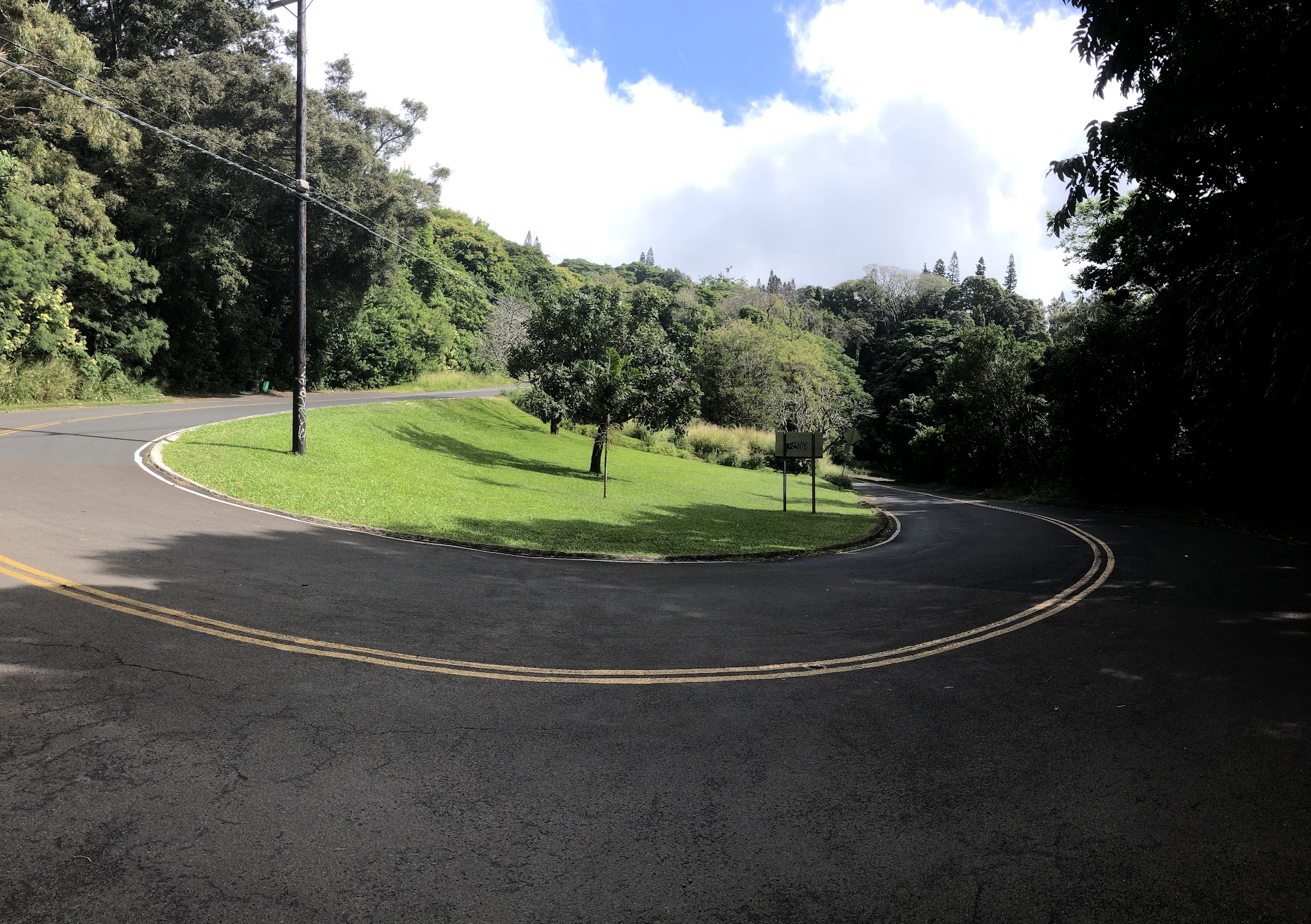 Climbing by bike Tantalus Drive - hairpin