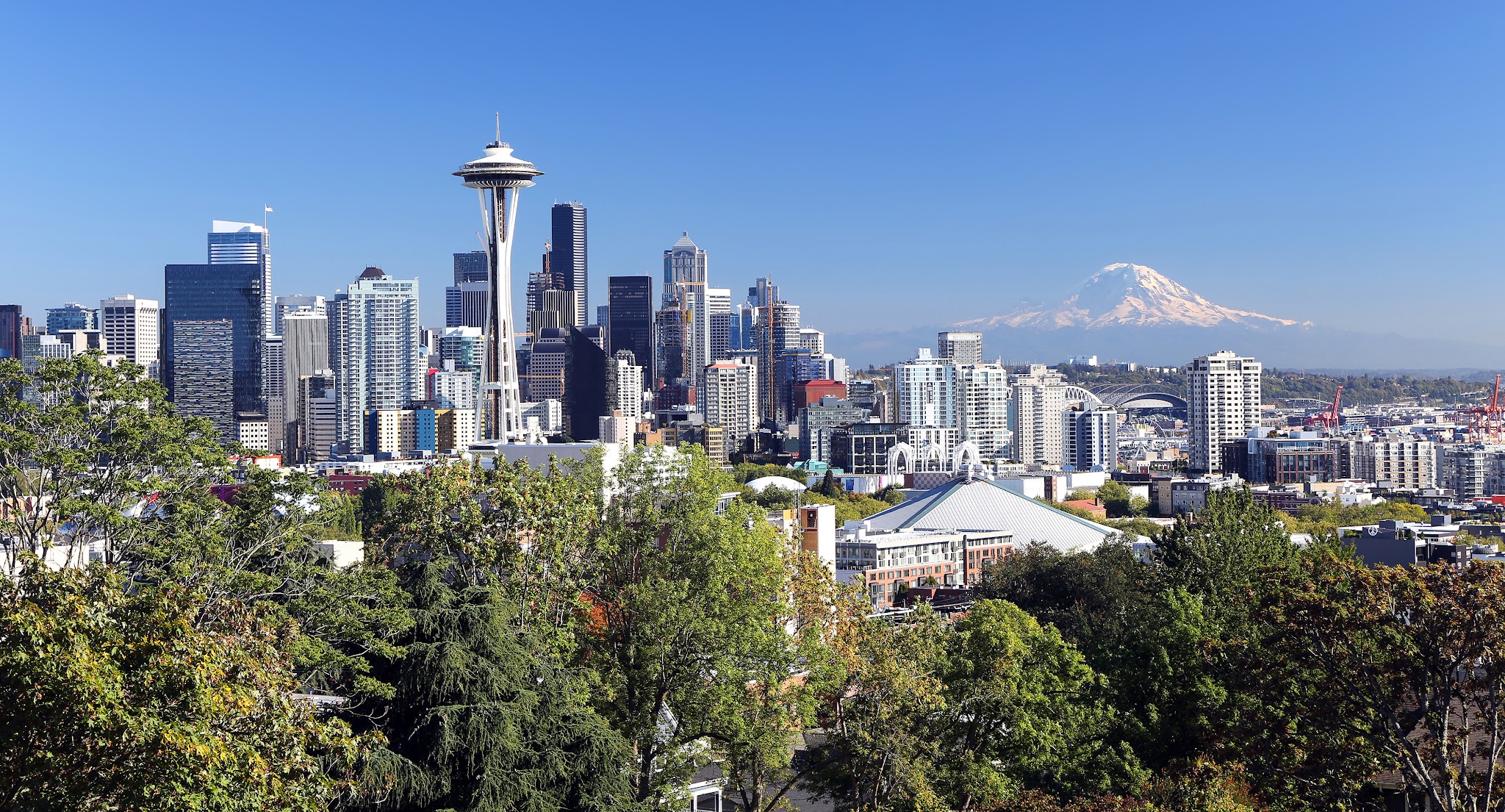 Cycling Chinook Pass, Washington - Seattle skyline as seen from Kerry Park in northwest Seattle, Mt. Rainier seen in the distance