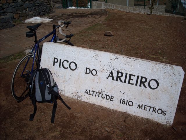 Top bike climbs in Europe  - Pico Ariero, Portugal - bike leaning against altitude sign