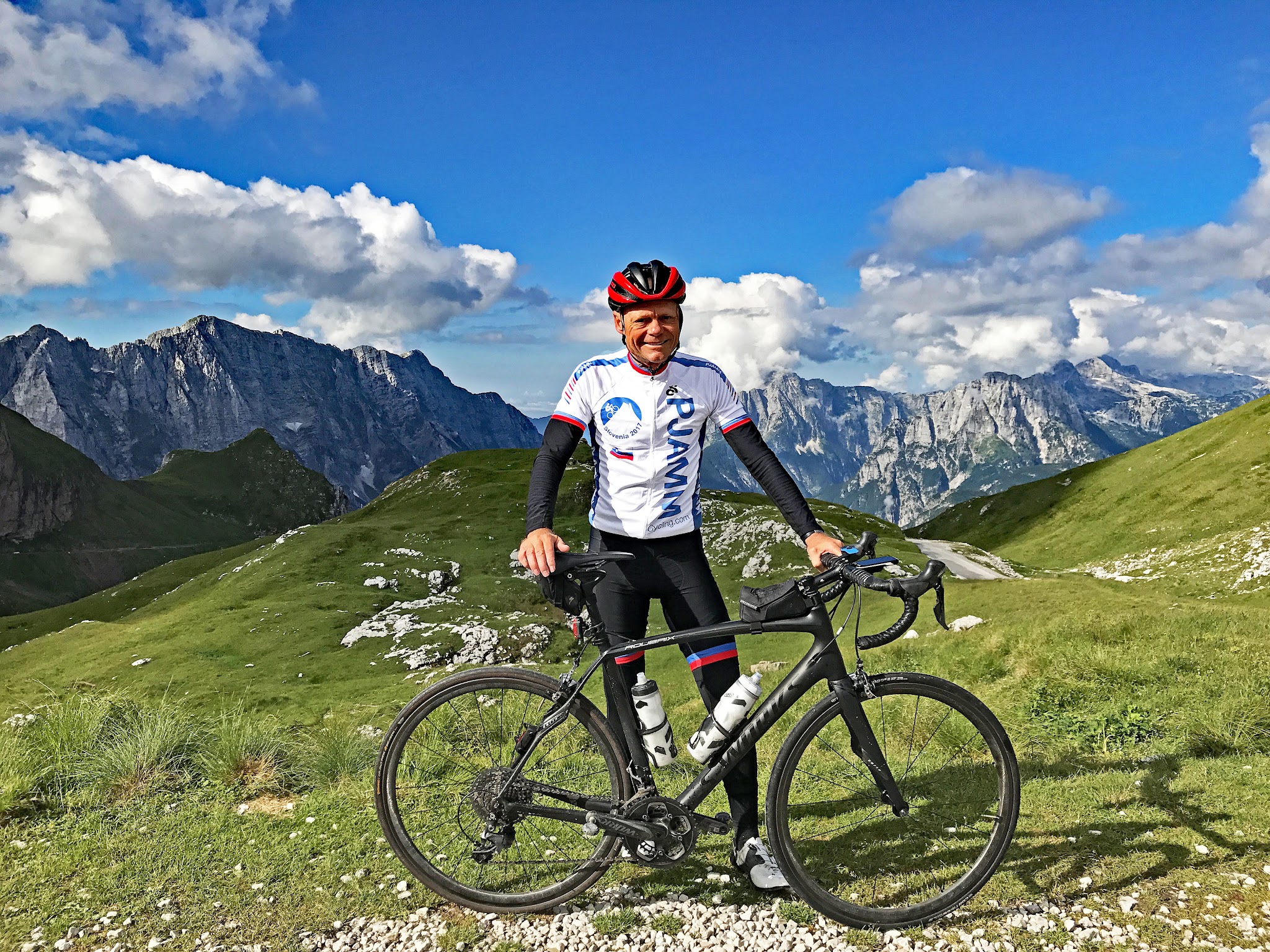 Vzpon na Mangart Cycling Vzpon na Mangart - pjamm cycling john johnson at finish with bike