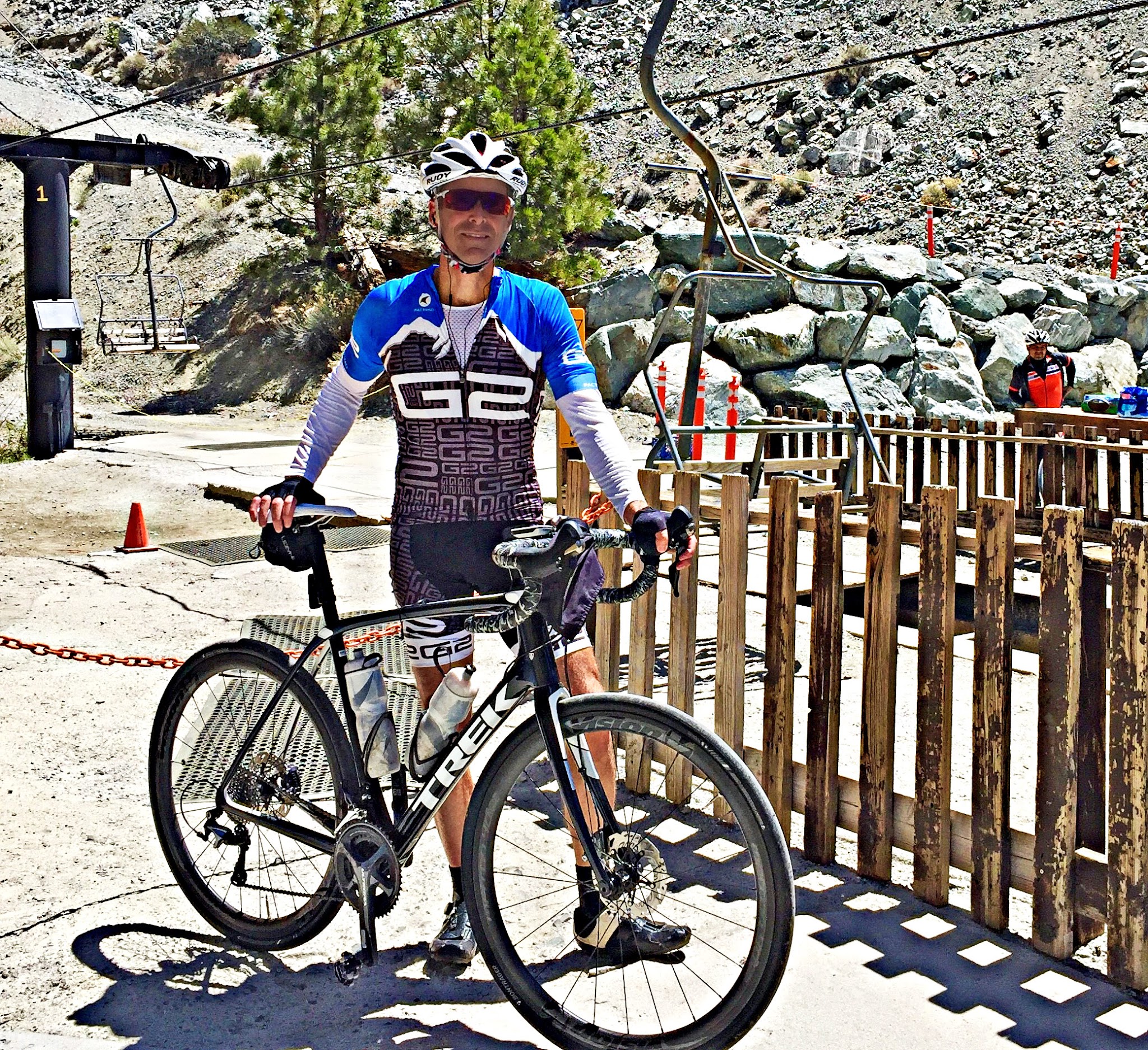 PJAMM Cyclist Daniel Patrick stands at summit of Mt. Baldy bike climb with his Trck Domane SL6 bike