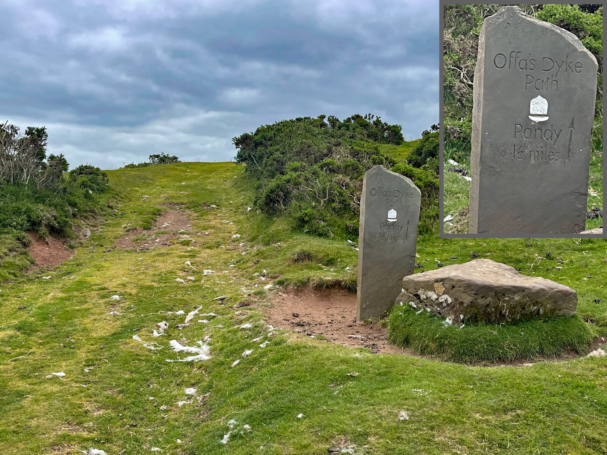 Cycling Gospel Pass North, Wales stone marker for Offa's Dyke path at mile 1.3 of climb