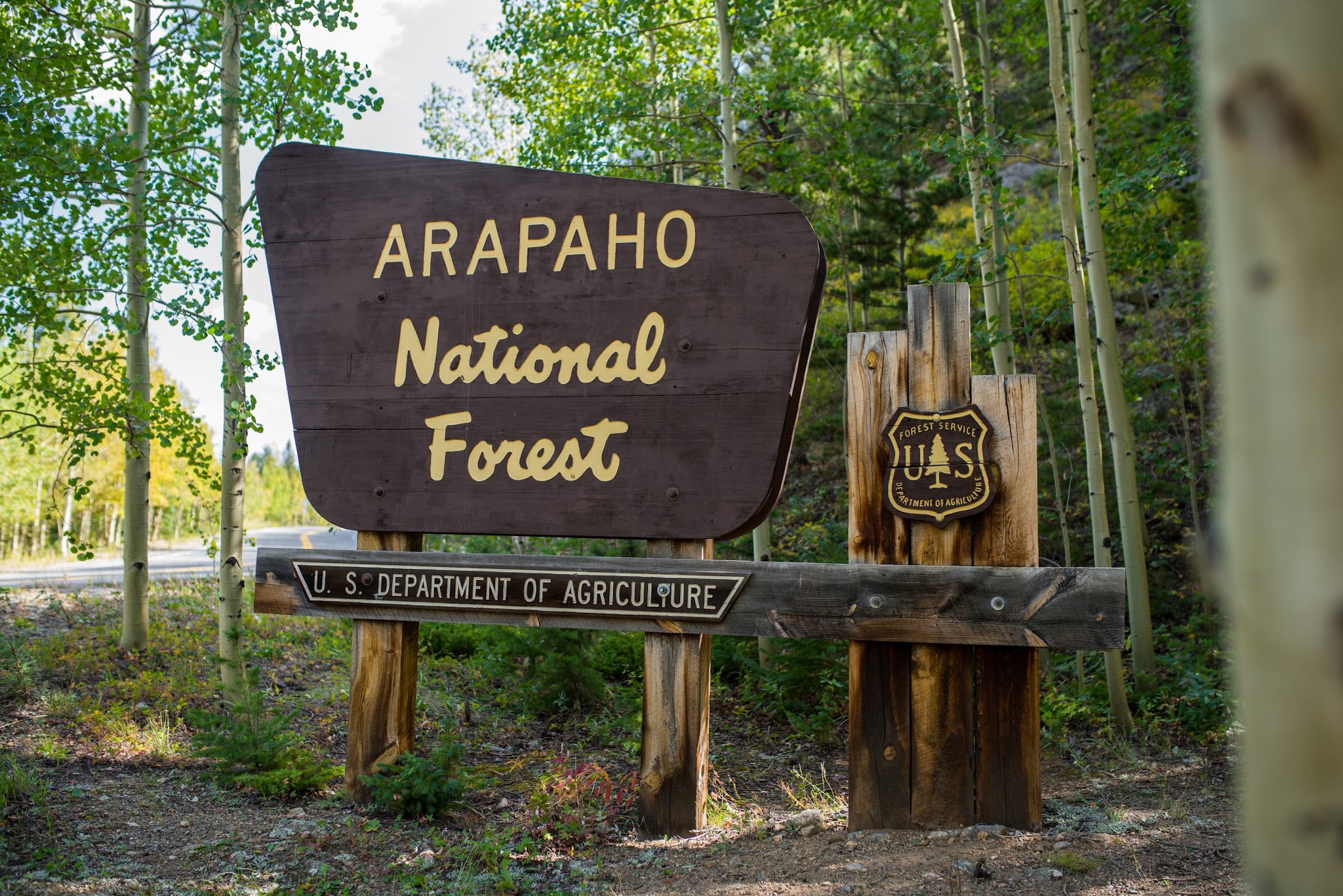 Bike climb Mt. Evans  - Arapaho National Forest sign on Hwy 103 while riding by bike to Mount Evans, Rocky Mountains