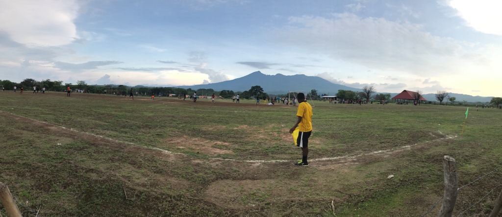 Mombacho Volcano cycling climb - soccer field in Granada with referee