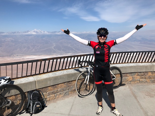 Cycling Death Valley National Park, California - PJAMM Cyclist stands at Dantes View overlooking Badwater