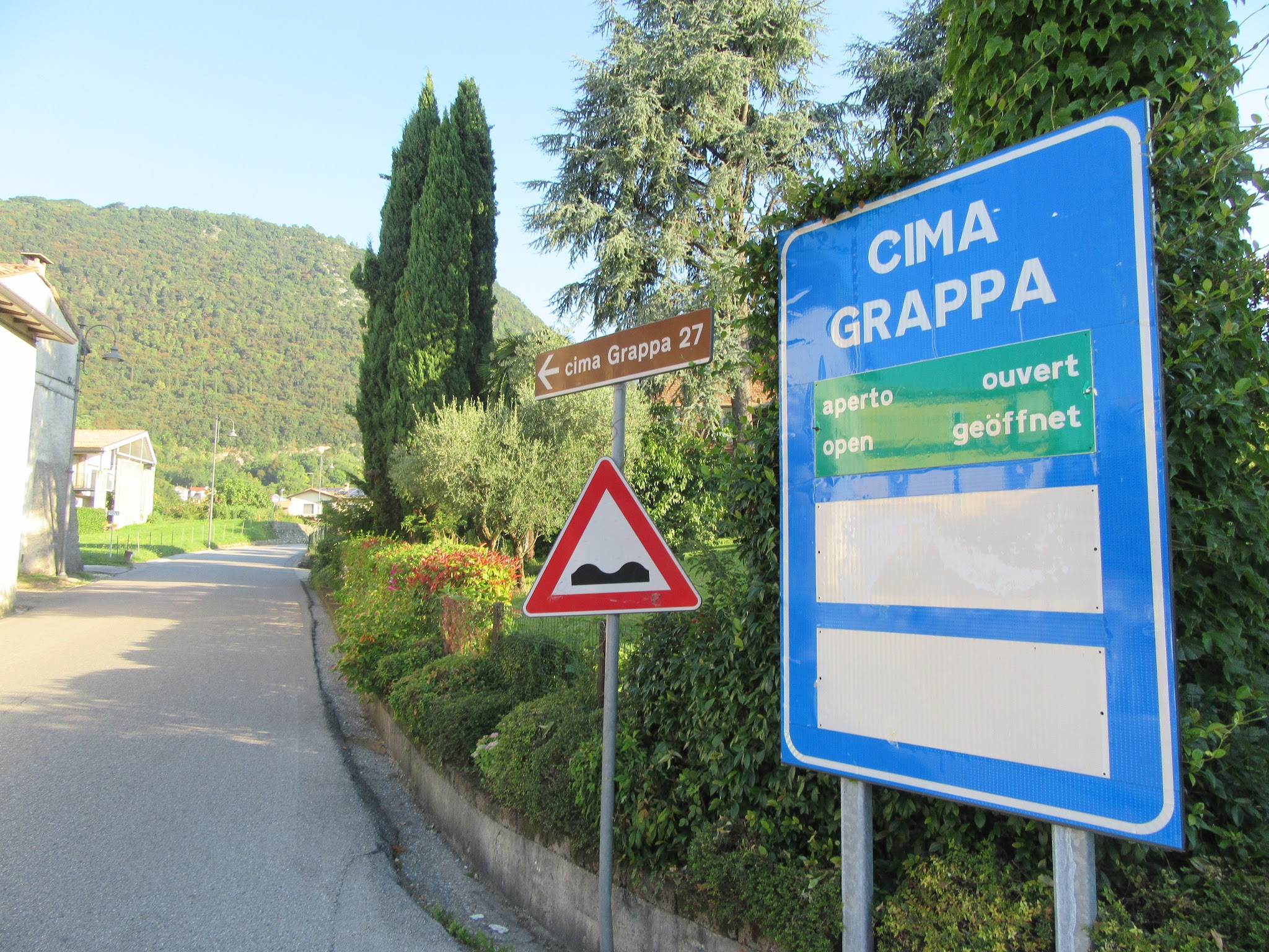 Cycling Monte Grappa from Romano d'Ezzilino - start, road sign Cima Grappa