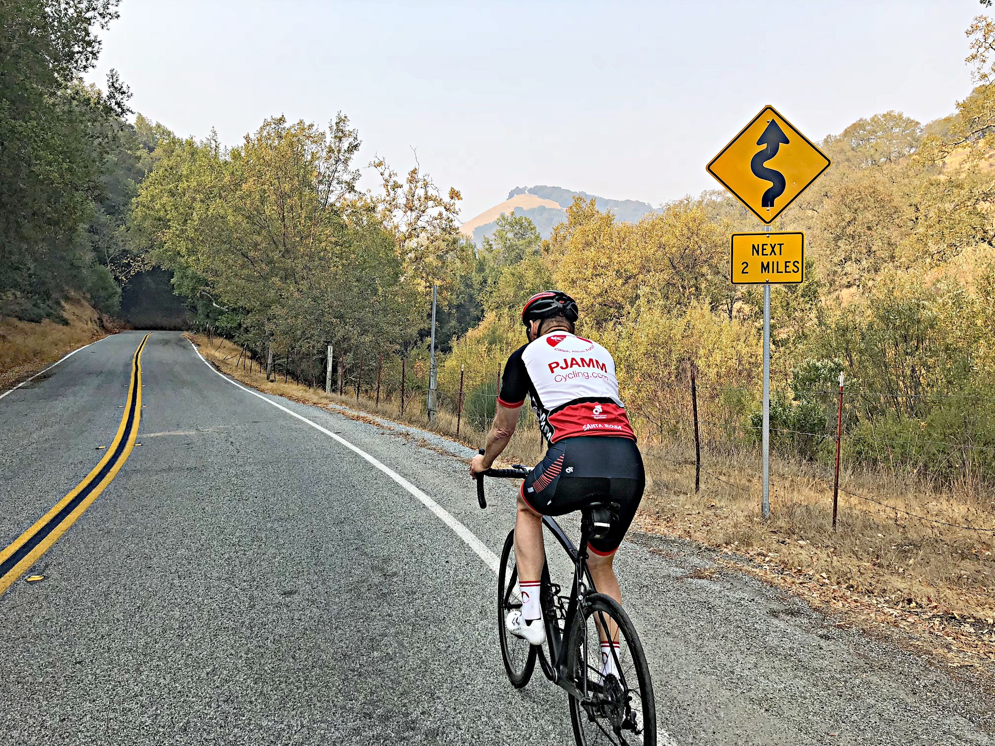 PJAMM cyclists on Hicks Road riding bike to Mt Umunhum