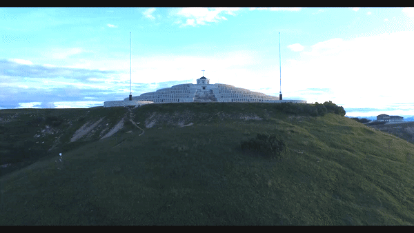 Cycling Monte Grappa from Semonzo - drone aerial photo of Sacrario del Monte Grappa - summit with clouds, Sacrario Militare del Monte Grappa and ossuary 