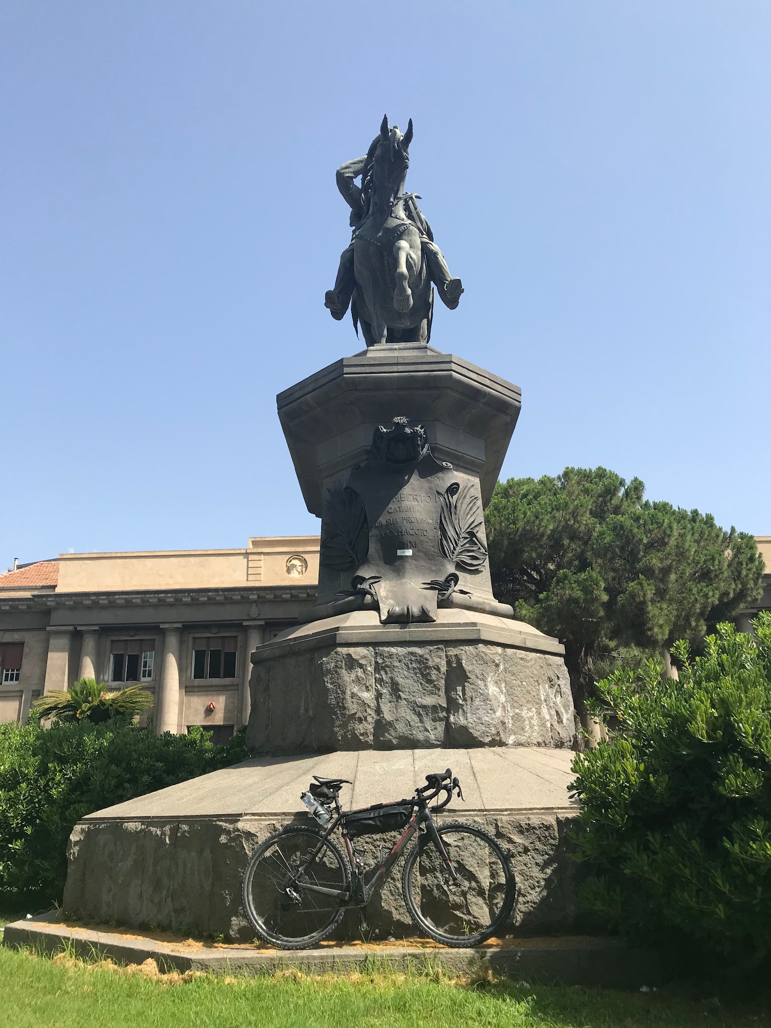 bike at statue in Catania Italy