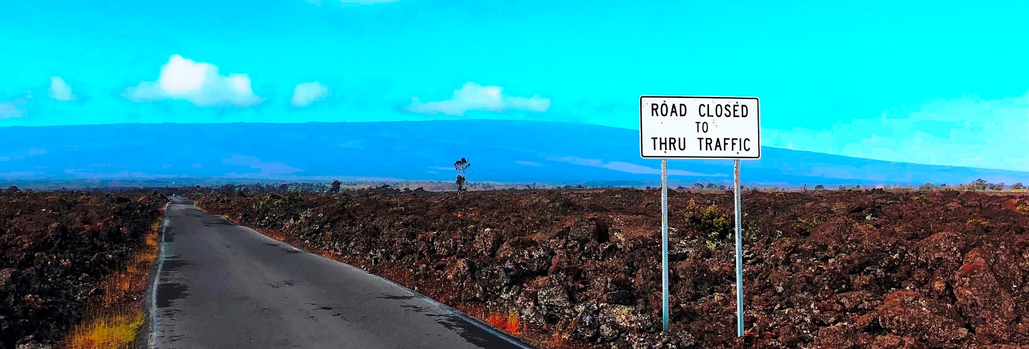 Cycling Highest bike climbs in the world - Mauna Loa, lava fields, road, road closed sign