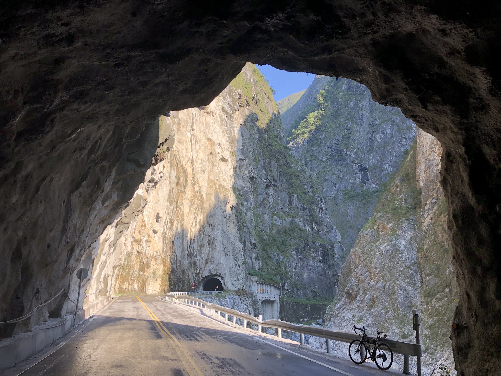 Climbing Wuling Pass East by bike - tunnel, bike, road