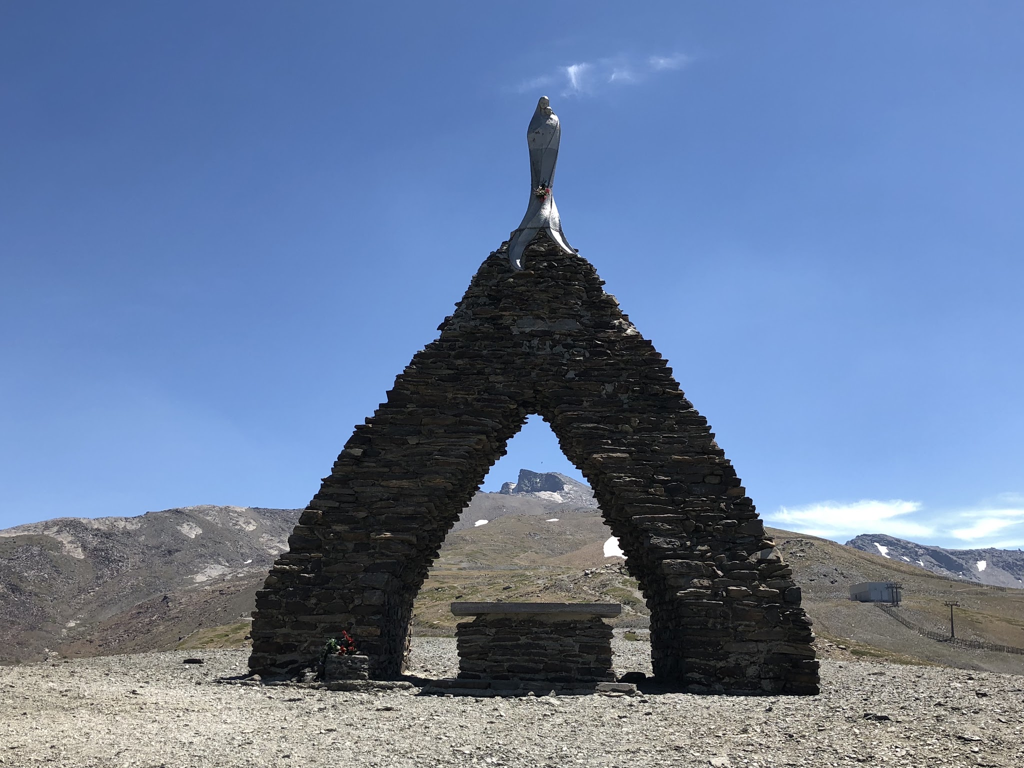 Cycling Pico de Veleta - Highest bike climbs in Europe - Pico de Veleta viewed through Virgen de Las Nieves.